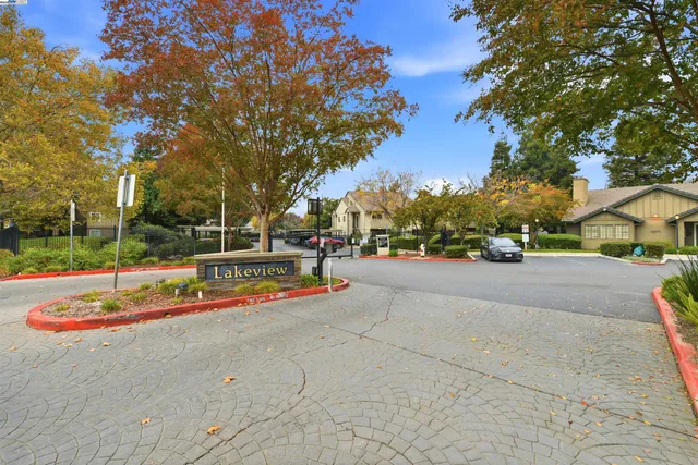 a view of outdoor space with playground and tree