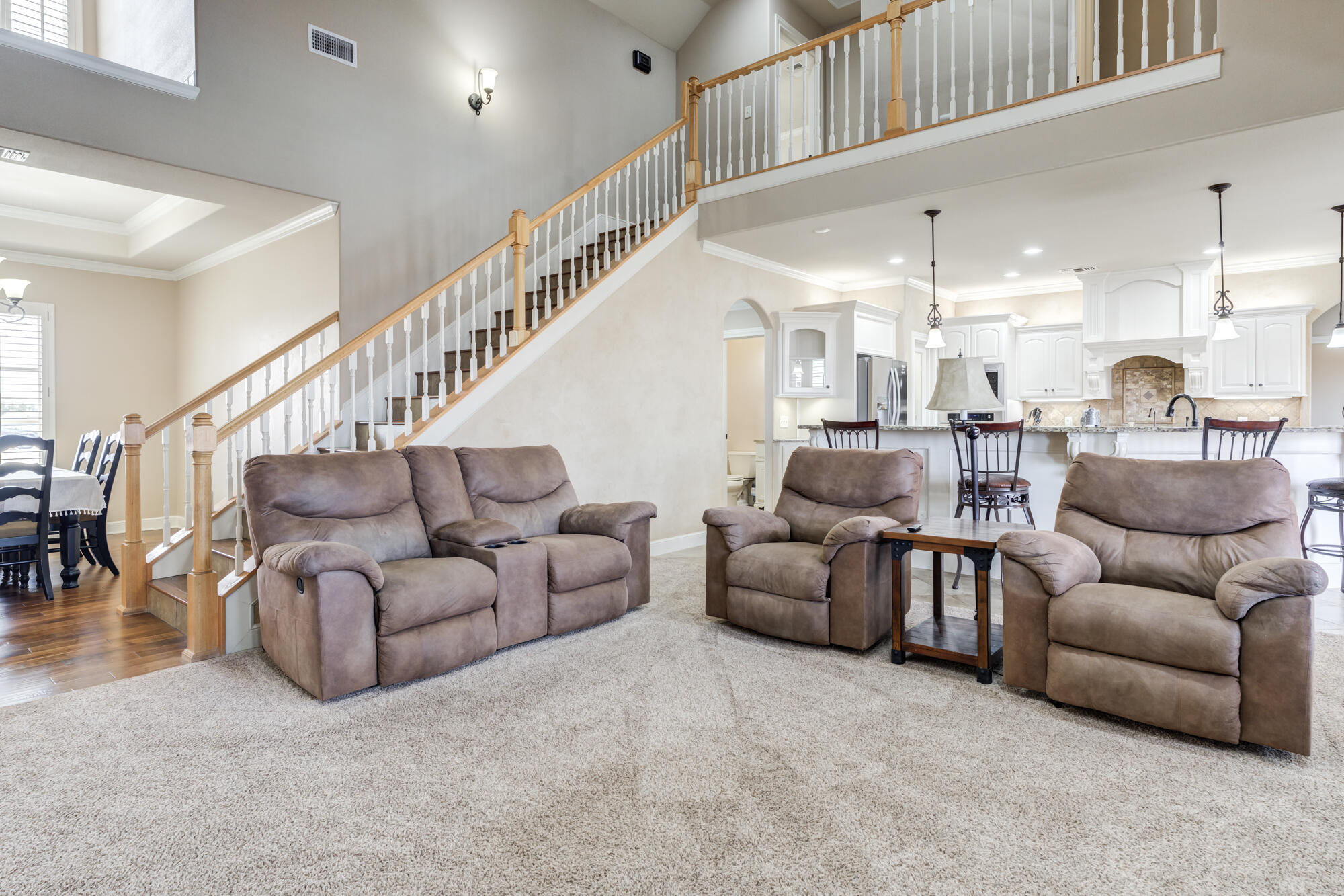 3206 County Road 7610 Lubbock, TX 79423 - Photo 14 of 93 a living room with furniture and a large window