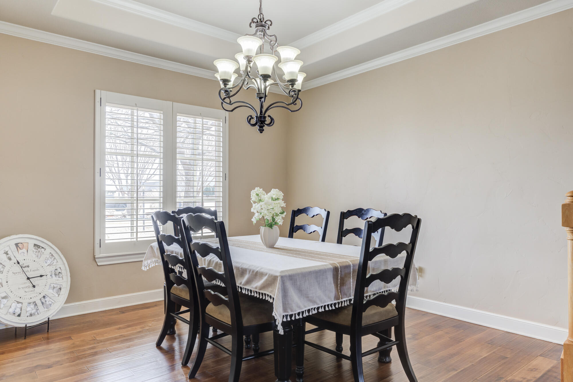 3206 County Road 7610 Lubbock, TX 79423 - Photo 25 of 93 a view of a dining room with furniture wooden floor and chandelier