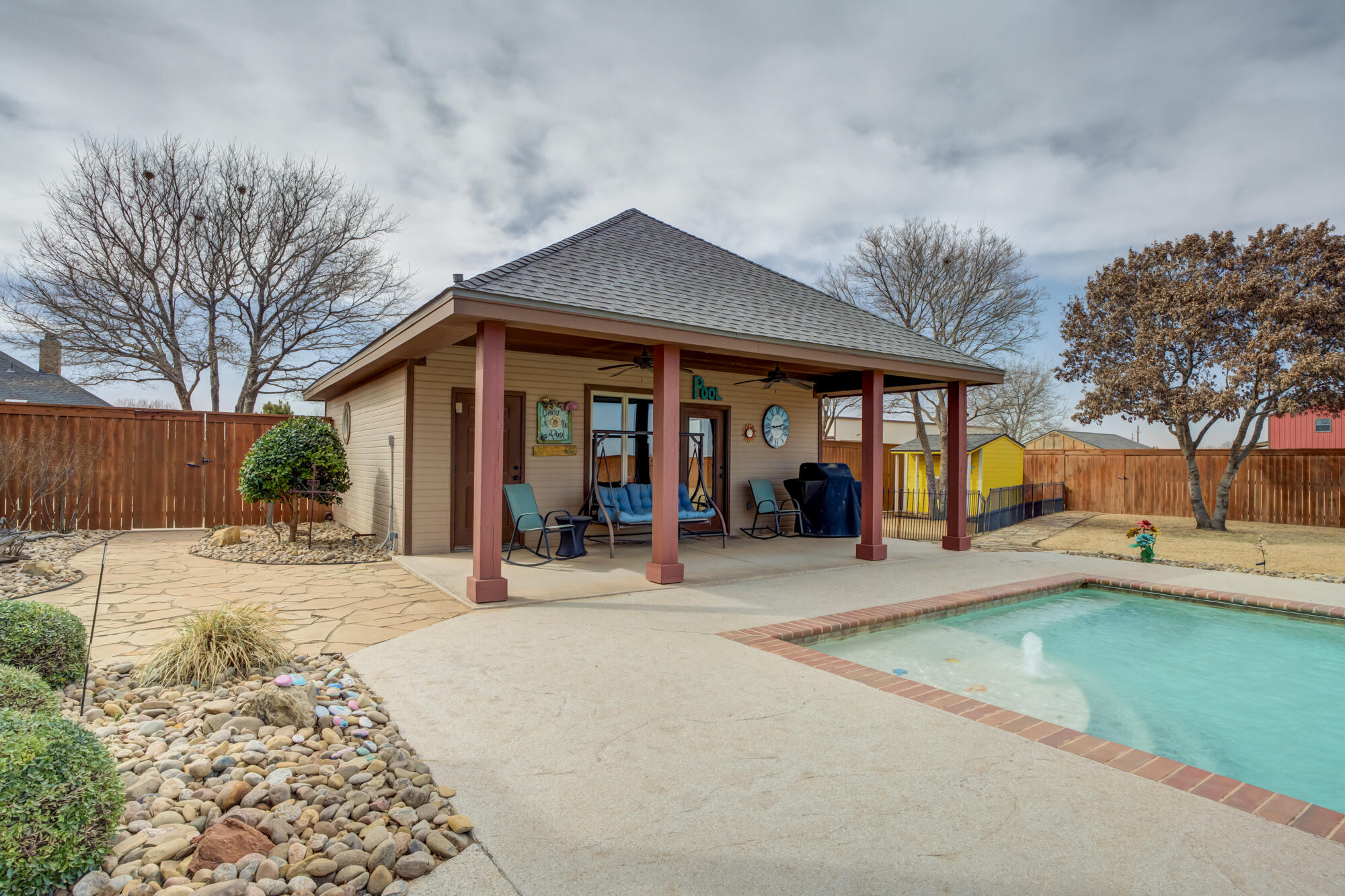 3206 County Road 7610 Lubbock, TX 79423 - Photo 62 of 93 a view of a house with a yard and large tree