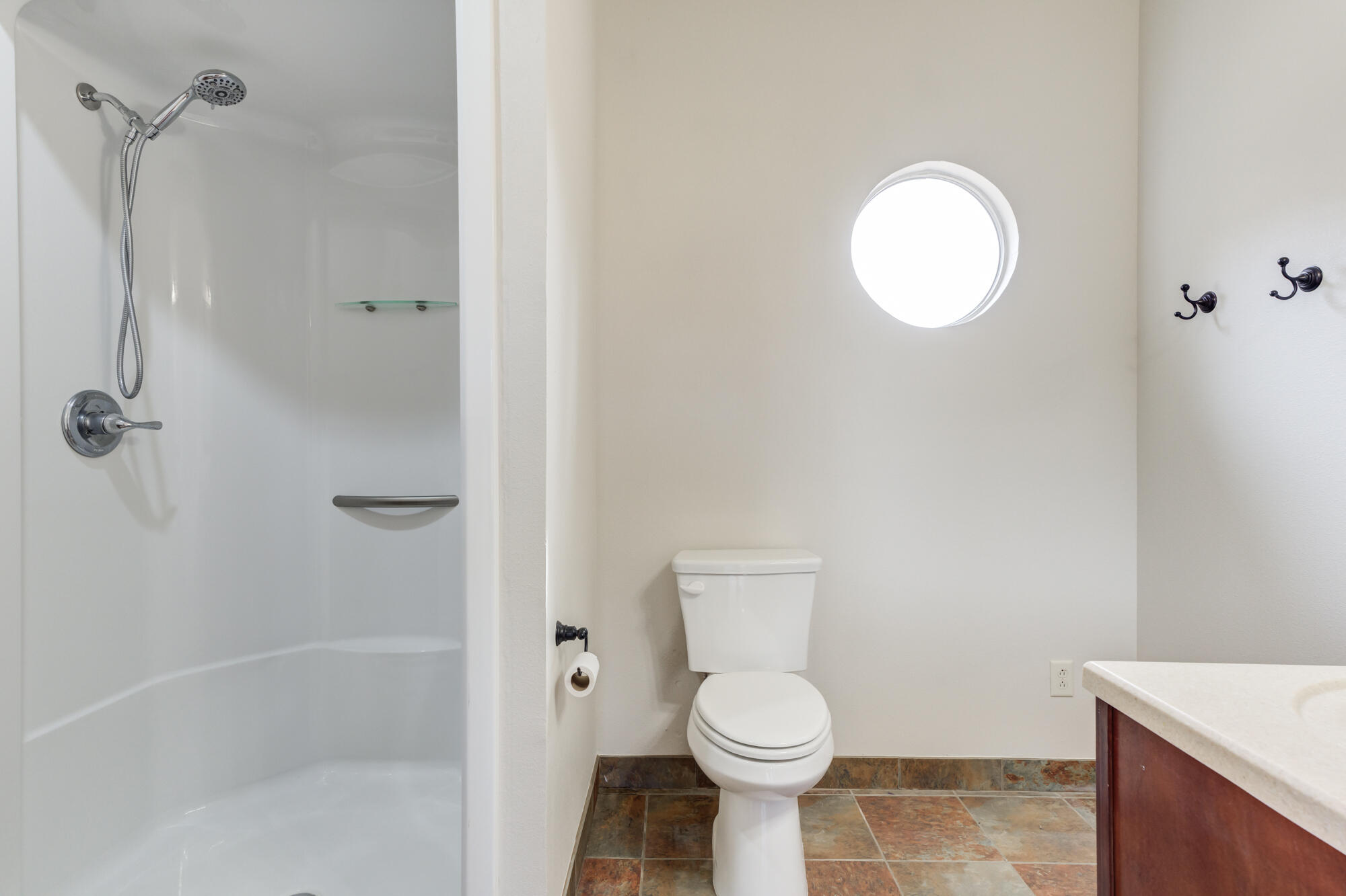 3206 County Road 7610 Lubbock, TX 79423 - Photo 67 of 93 a white toilet sitting next to a bath tub