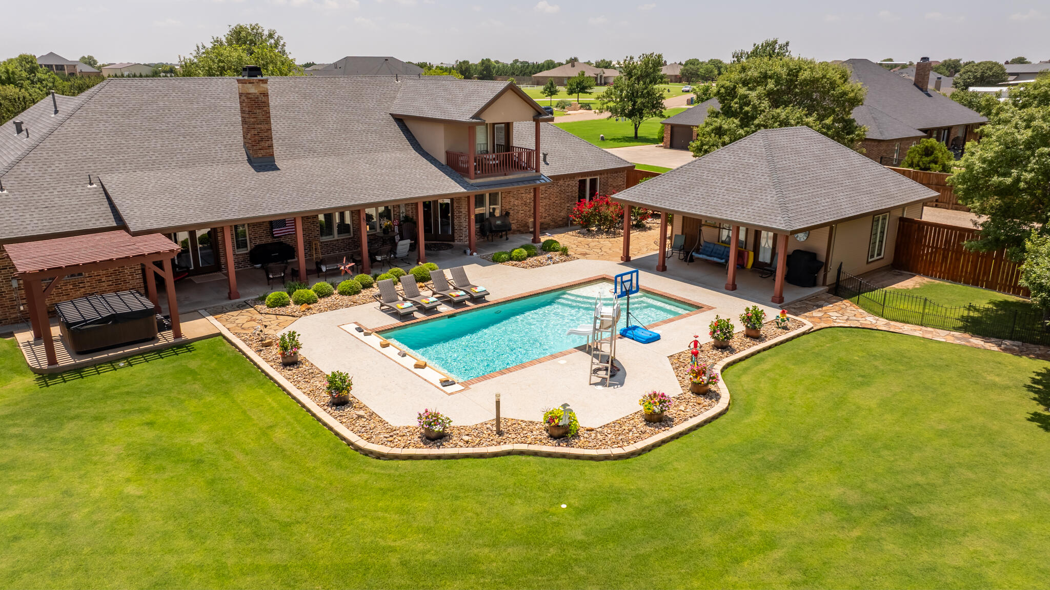 3206 County Road 7610 Lubbock, TX 79423 - Photo 74 of 93 an aerial view of a house with swimming pool garden and patio