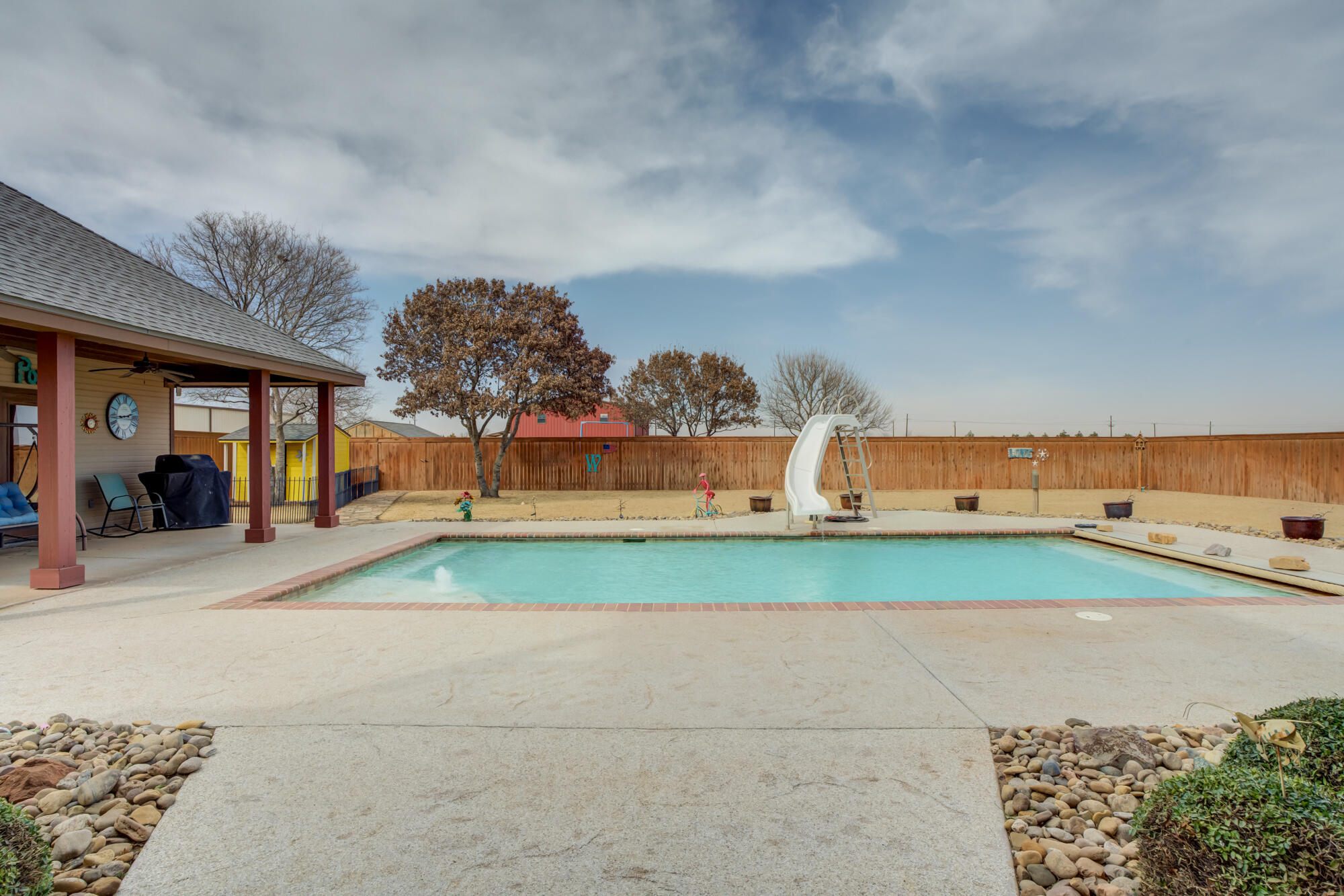 3206 County Road 7610 Lubbock, TX 79423 - Photo 91 of 93 a view of outdoor space yard and swimming pool