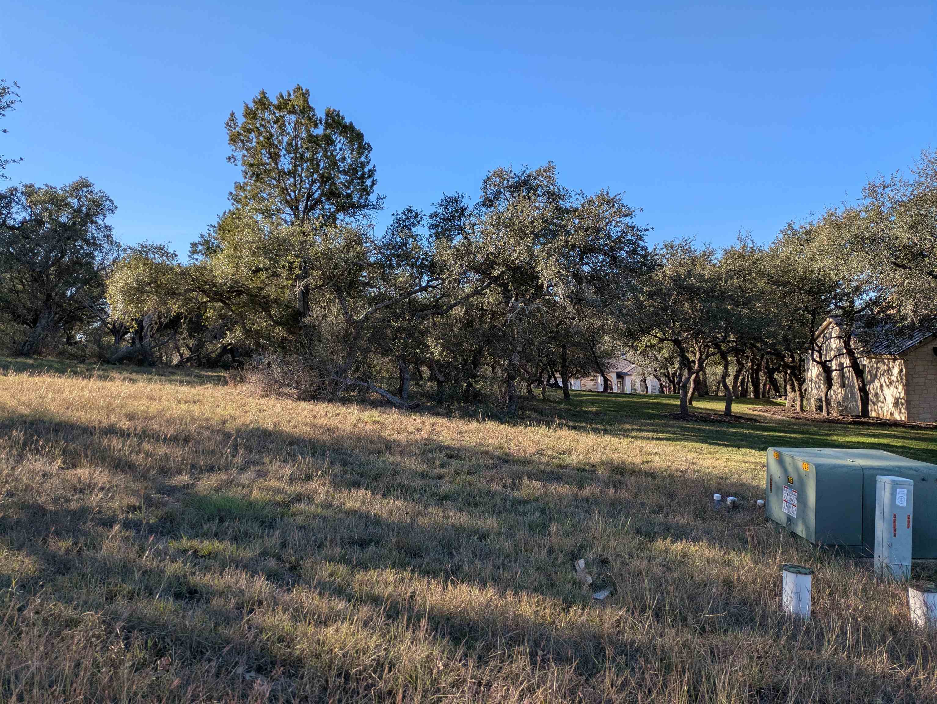 W35083 Mountain Home Road Horseshoe Bay, TX 78657 - Photo 2 of 3 a view of a yard with a house