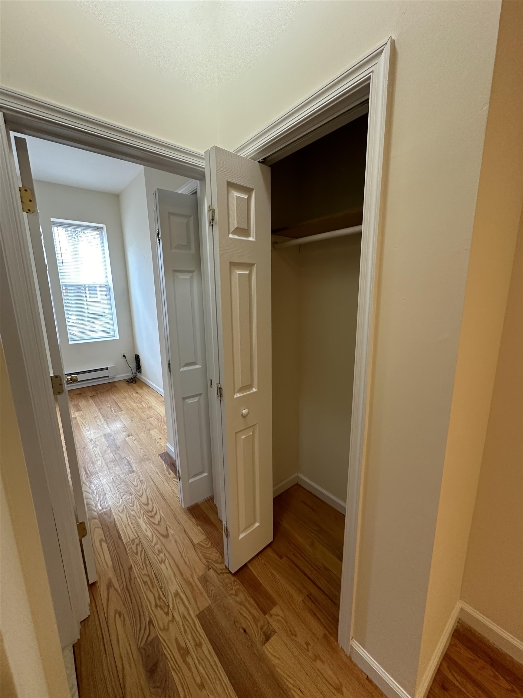942 Willow Avenue, Unit 1L Hoboken, NJ 07030 - Photo 10 of 12 a view of a hallway with wooden floor