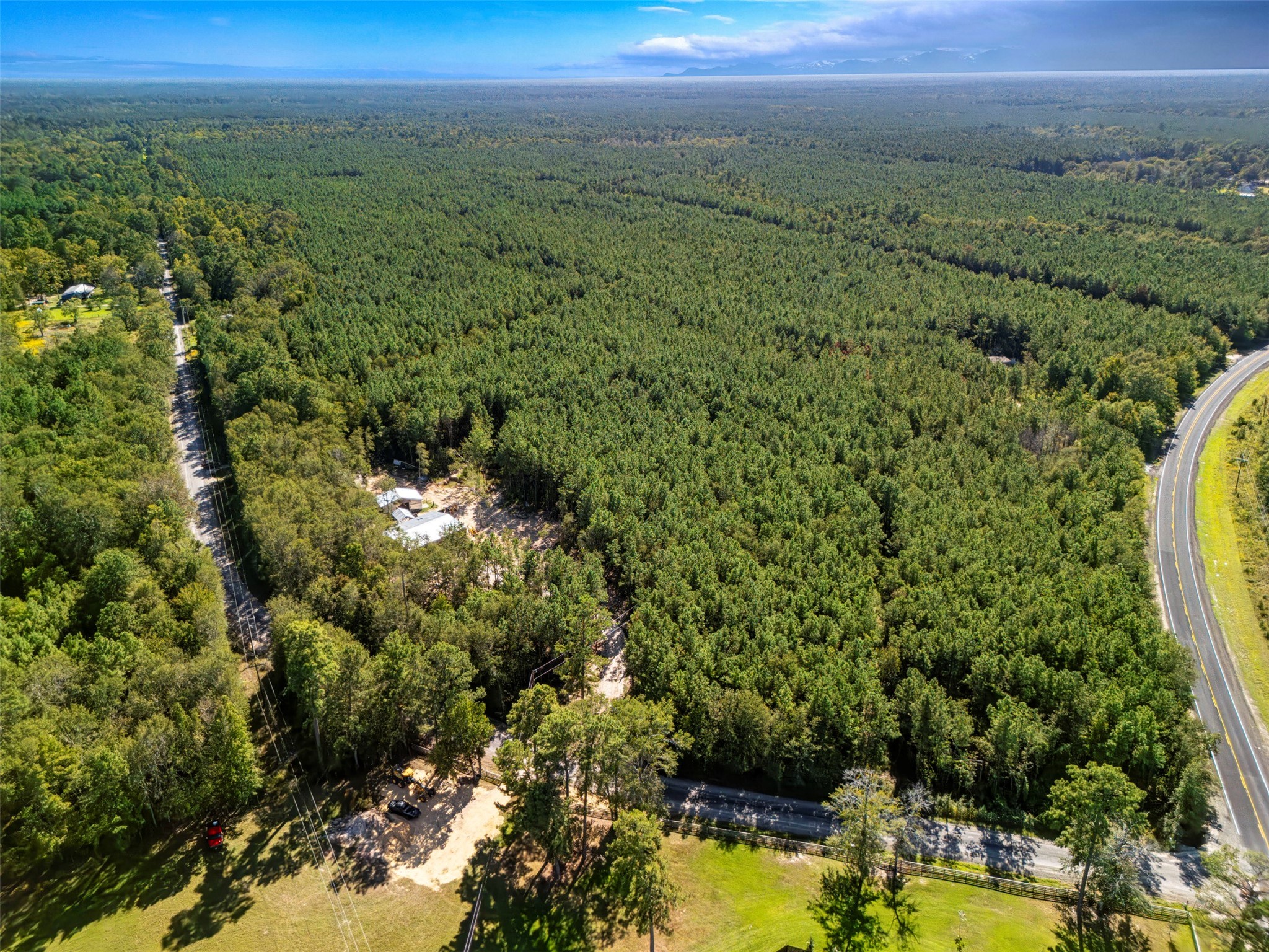 0 Fm 770 Saratoga, TX 77585 - Photo 6 of 12 a view of a forest with a houses