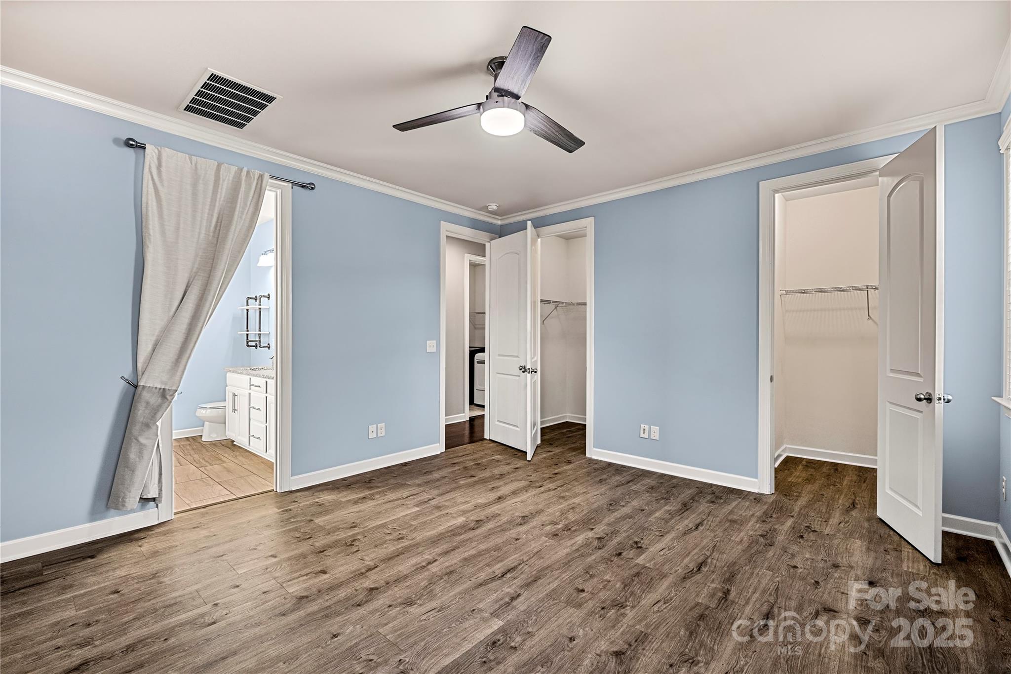 2830 Berkhamstead Circle Concord, NC 28027 - Photo 14 of 27 a view of an empty room with wooden floor and a window