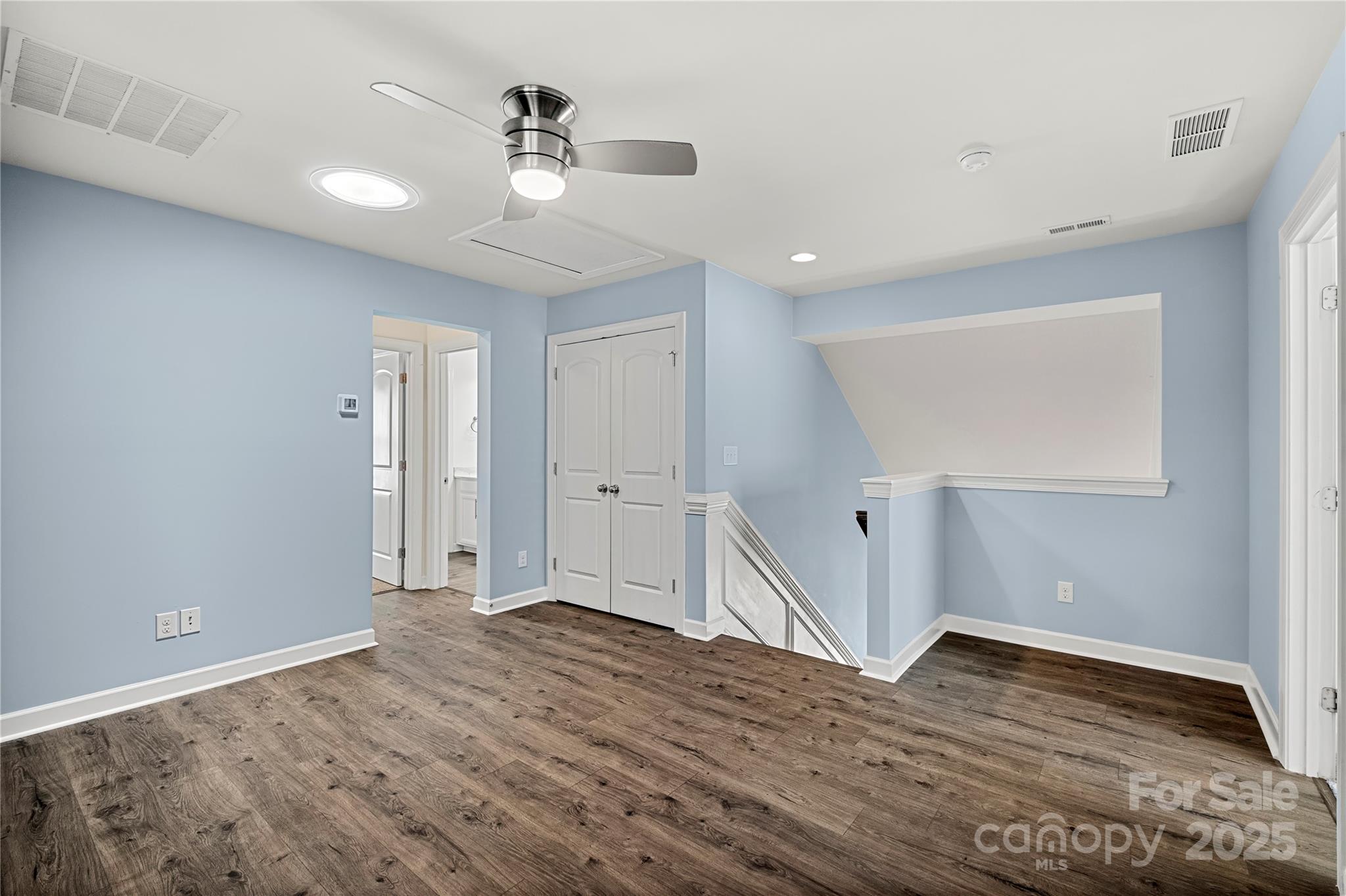 2830 Berkhamstead Circle Concord, NC 28027 - Photo 17 of 27 a view of empty room with wooden floor