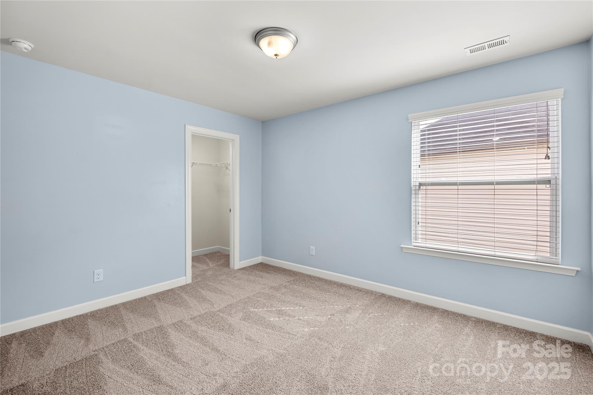 2830 Berkhamstead Circle Concord, NC 28027 - Photo 19 of 27 a view of an empty room with a window