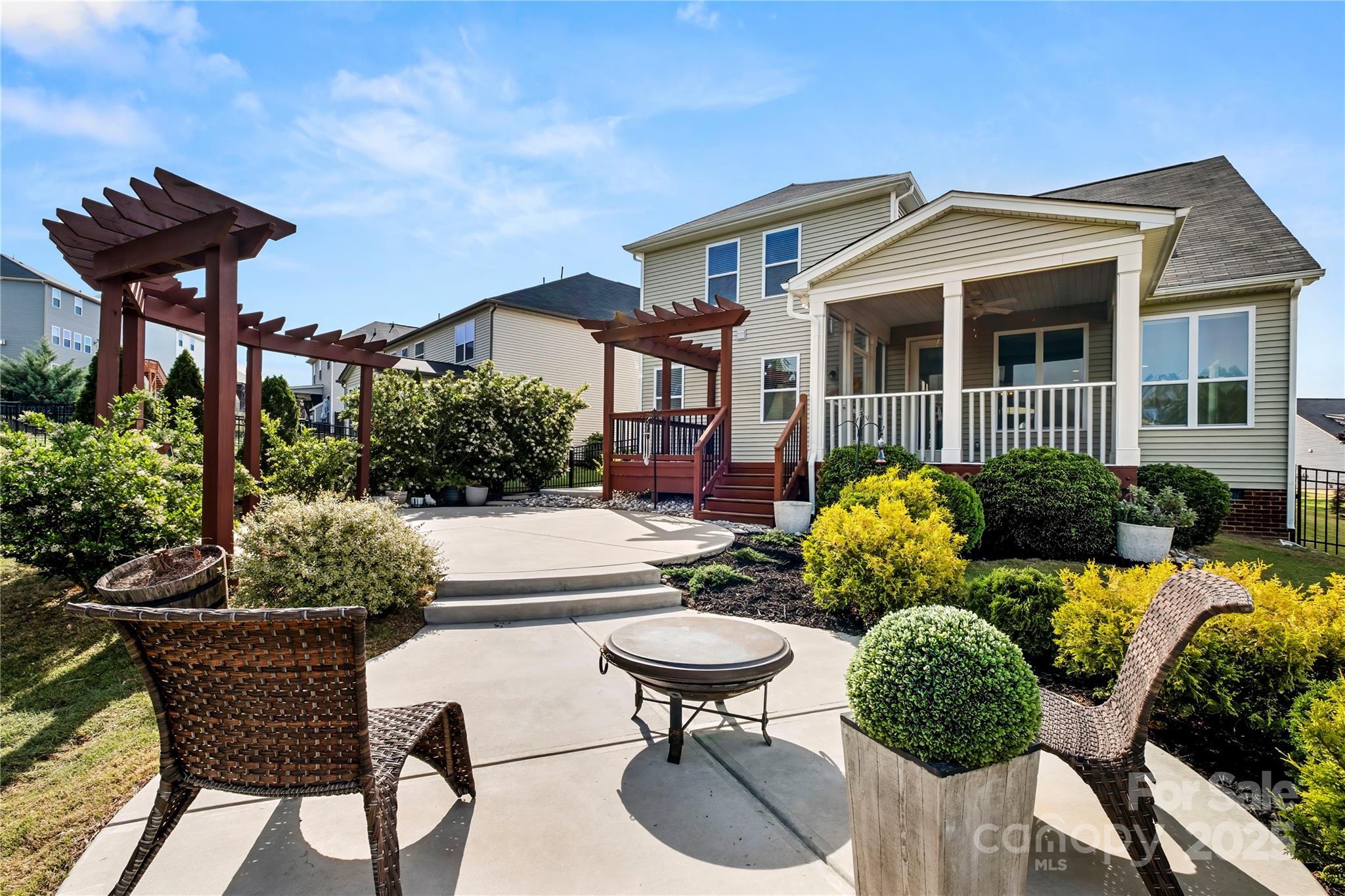 2830 Berkhamstead Circle Concord, NC 28027 - Photo 27 of 27 a front view of a house with patio and fire pit