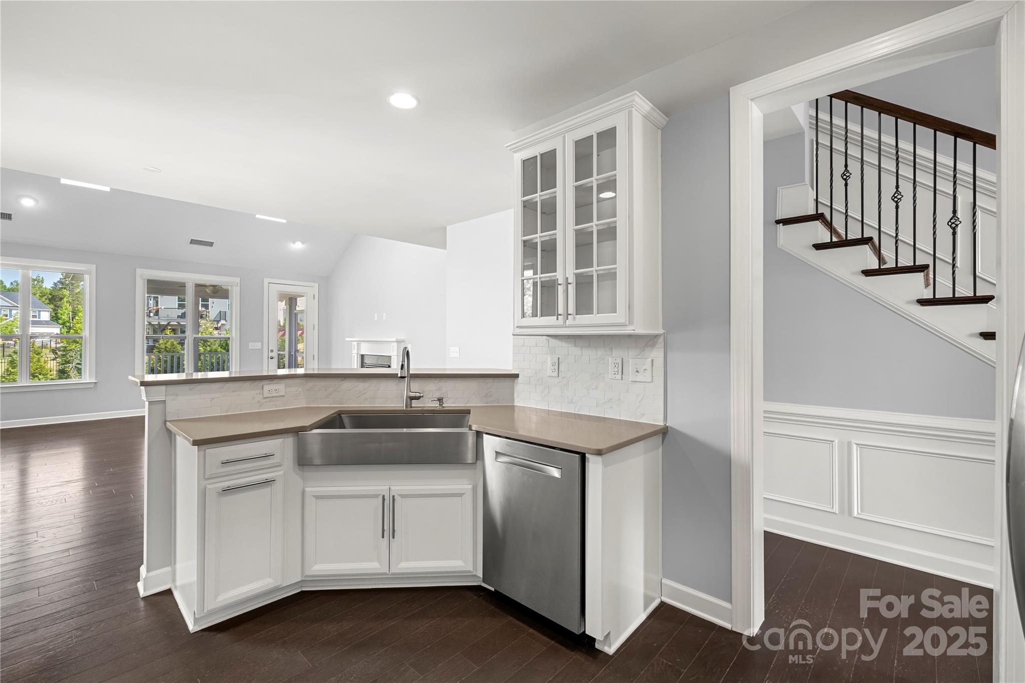 2830 Berkhamstead Circle Concord, NC 28027 - Photo 6 of 27 a kitchen with white cabinets and sink
