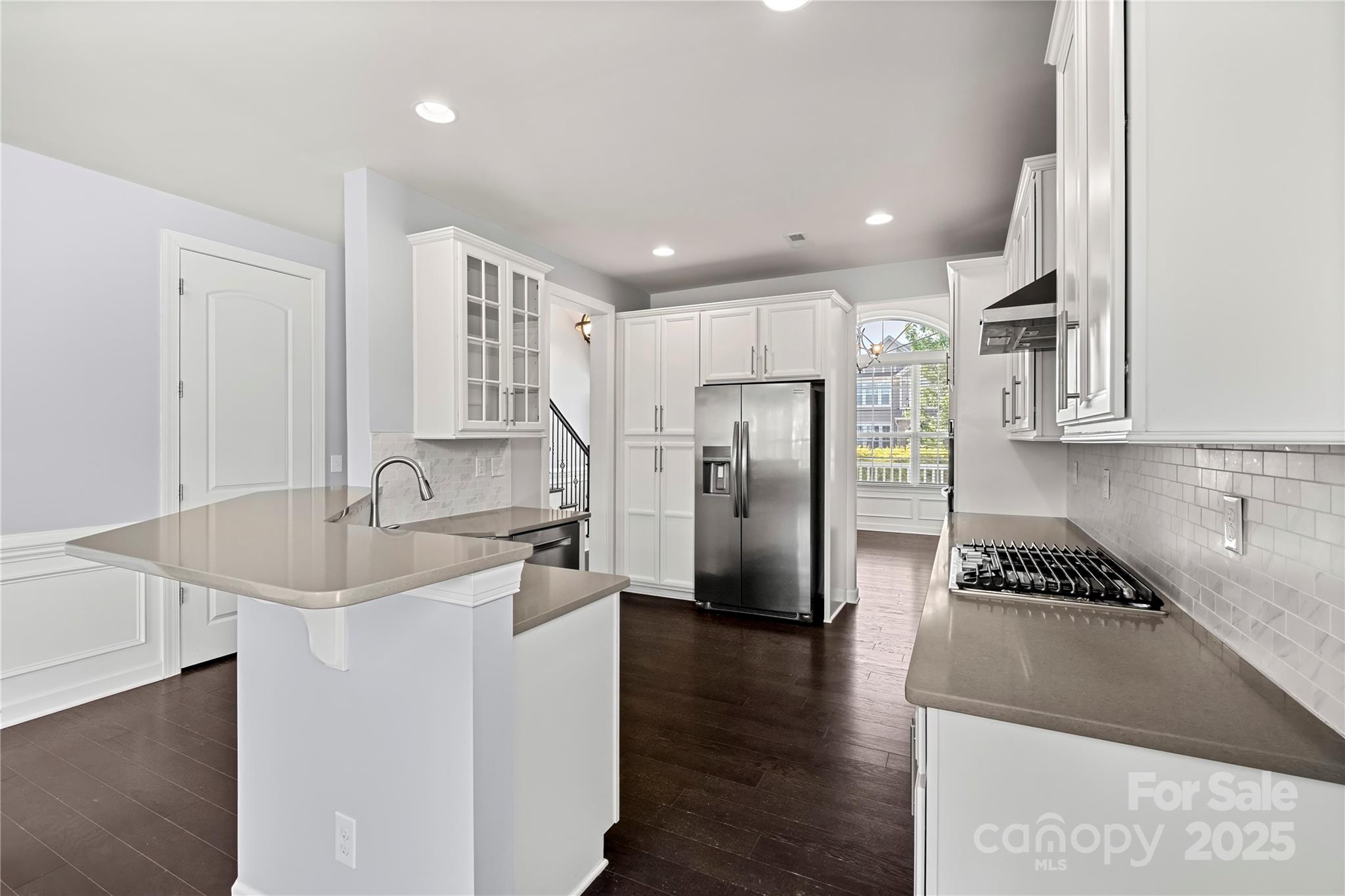 2830 Berkhamstead Circle Concord, NC 28027 - Photo 7 of 27 a kitchen with refrigerator and cabinets