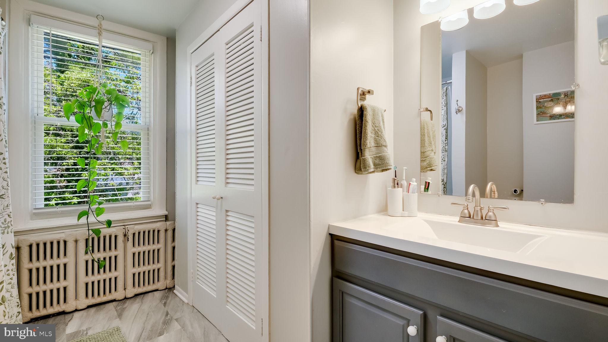 264 North Aberdeen Avenue Wayne, PA 19087 - Photo 16 of 18 a bathroom with a sink and a mirror