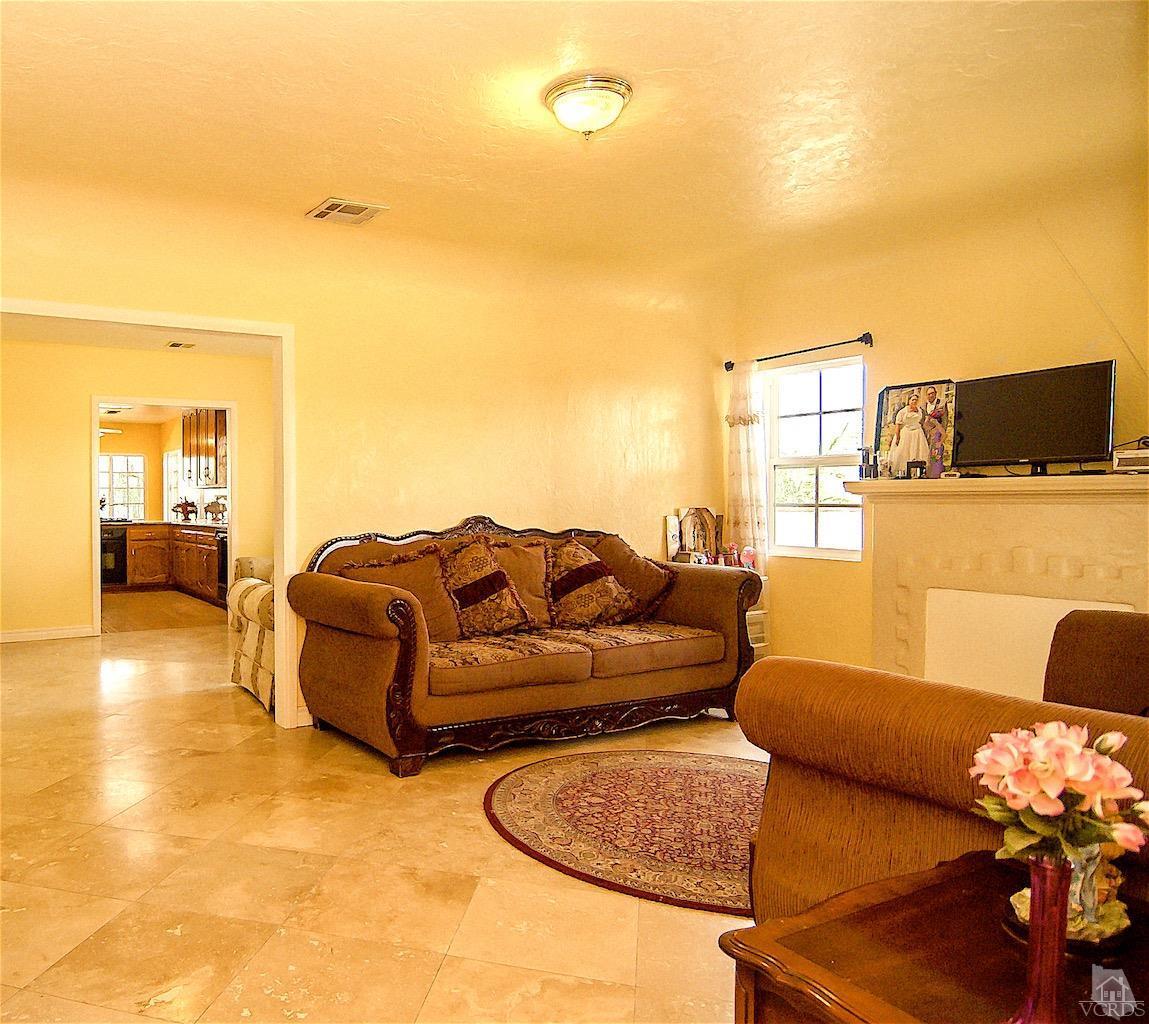 6487 Balcom Canyon Road Somis, CA 93066 - Photo 8 of 20 a living room with furniture and a flat screen tv