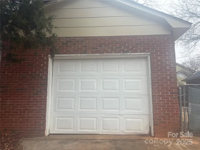 a view of a backyard of the house