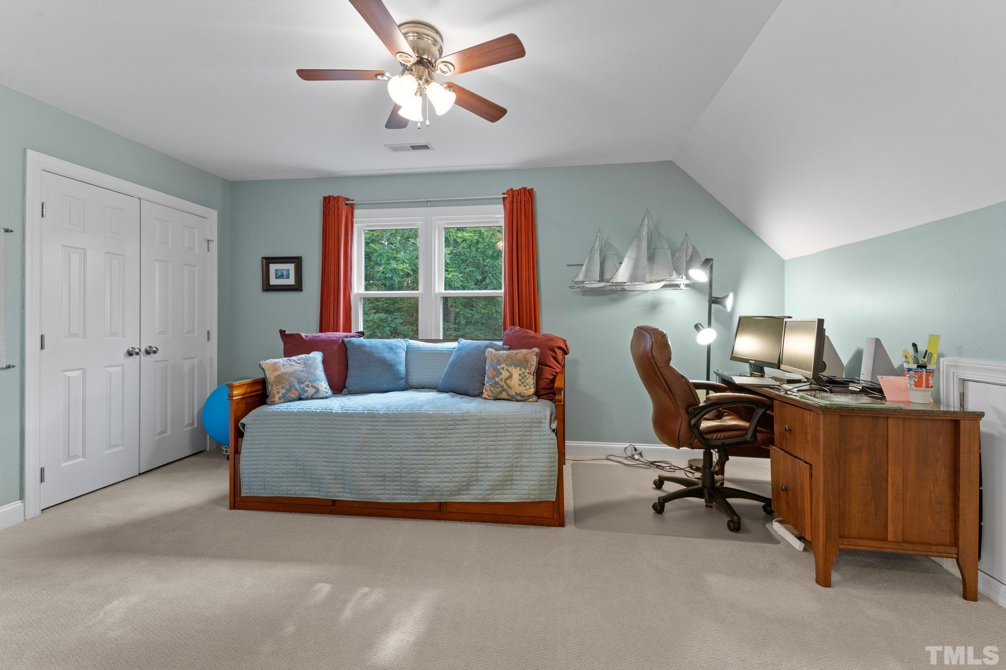 3812 Evander Way Raleigh, NC 27613 - Photo 29 of 52 a living room with furniture and a window