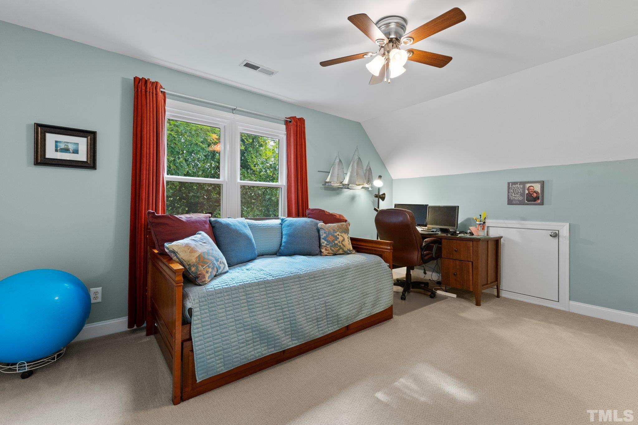 3812 Evander Way Raleigh, NC 27613 - Photo 30 of 52 a living room with furniture and a large window