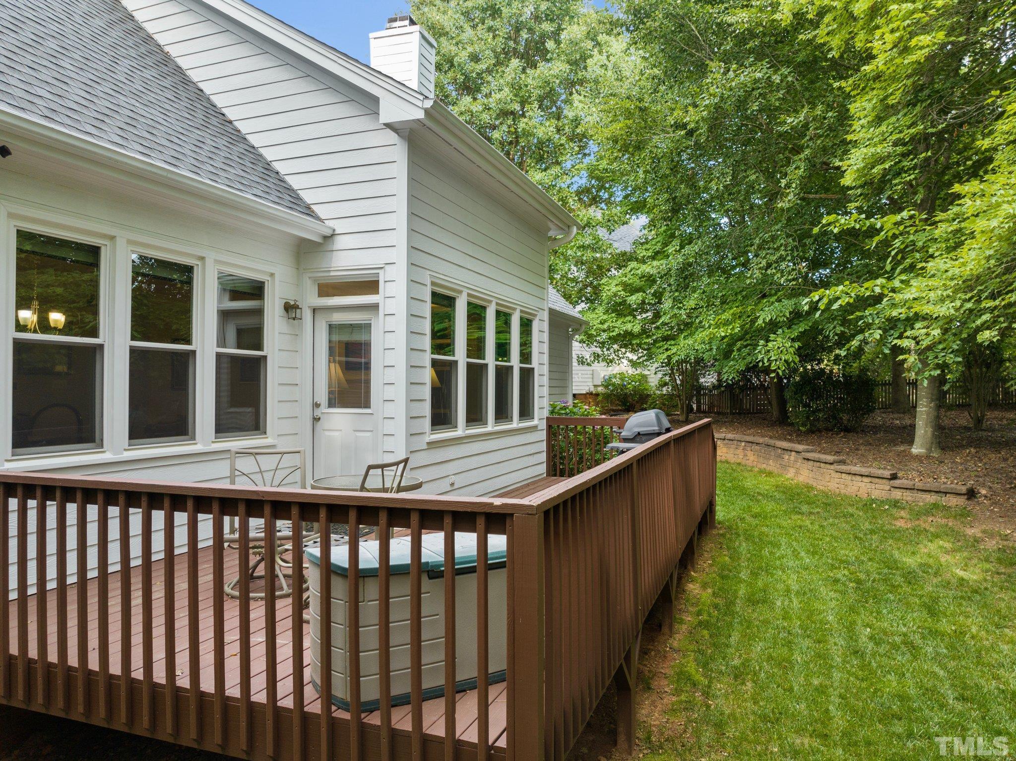 3812 Evander Way Raleigh, NC 27613 - Photo 43 of 52 a view of a house with backyard and sitting area