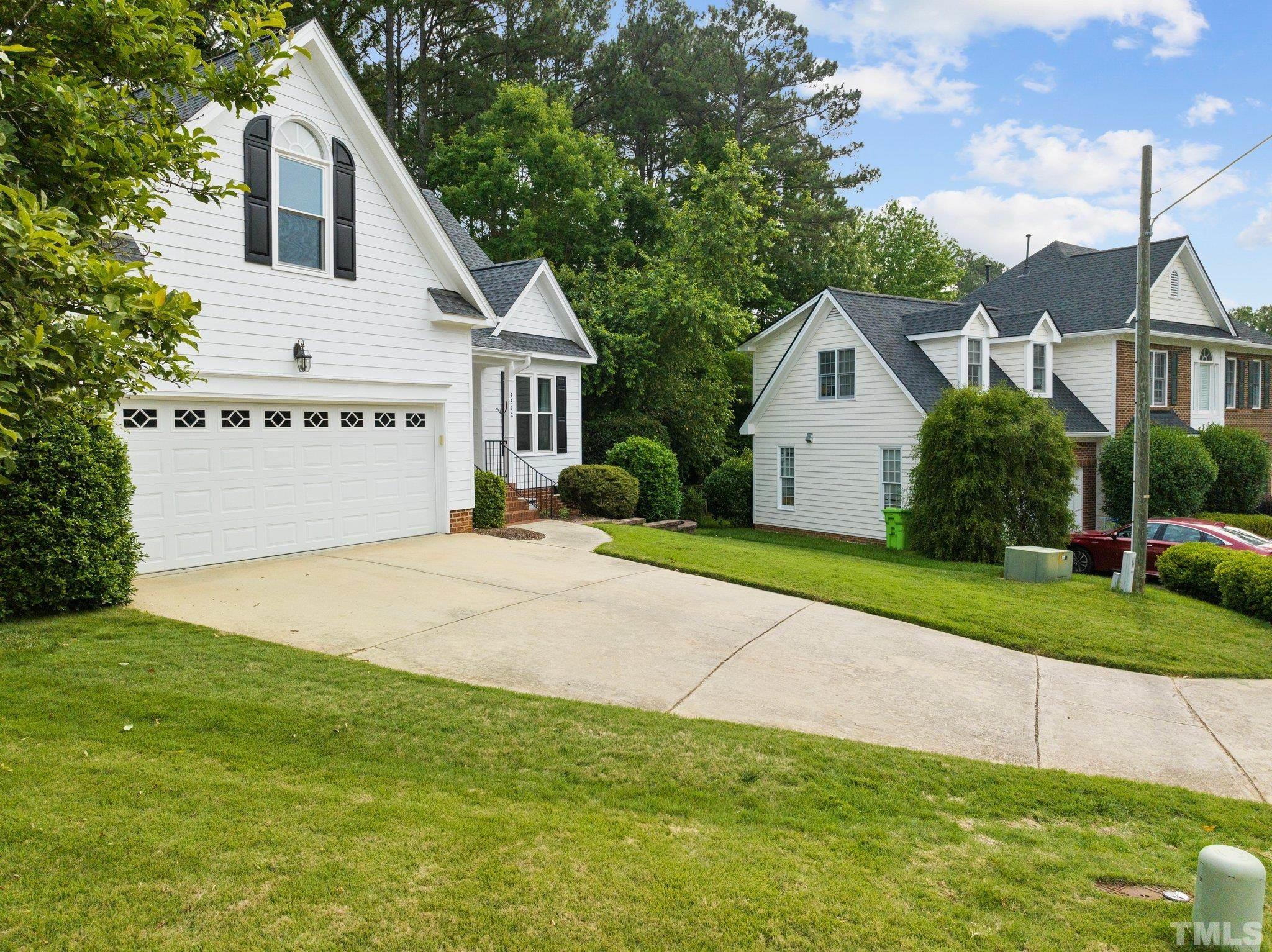 3812 Evander Way Raleigh, NC 27613 - Photo 7 of 52 a view of outdoor space yard and garage