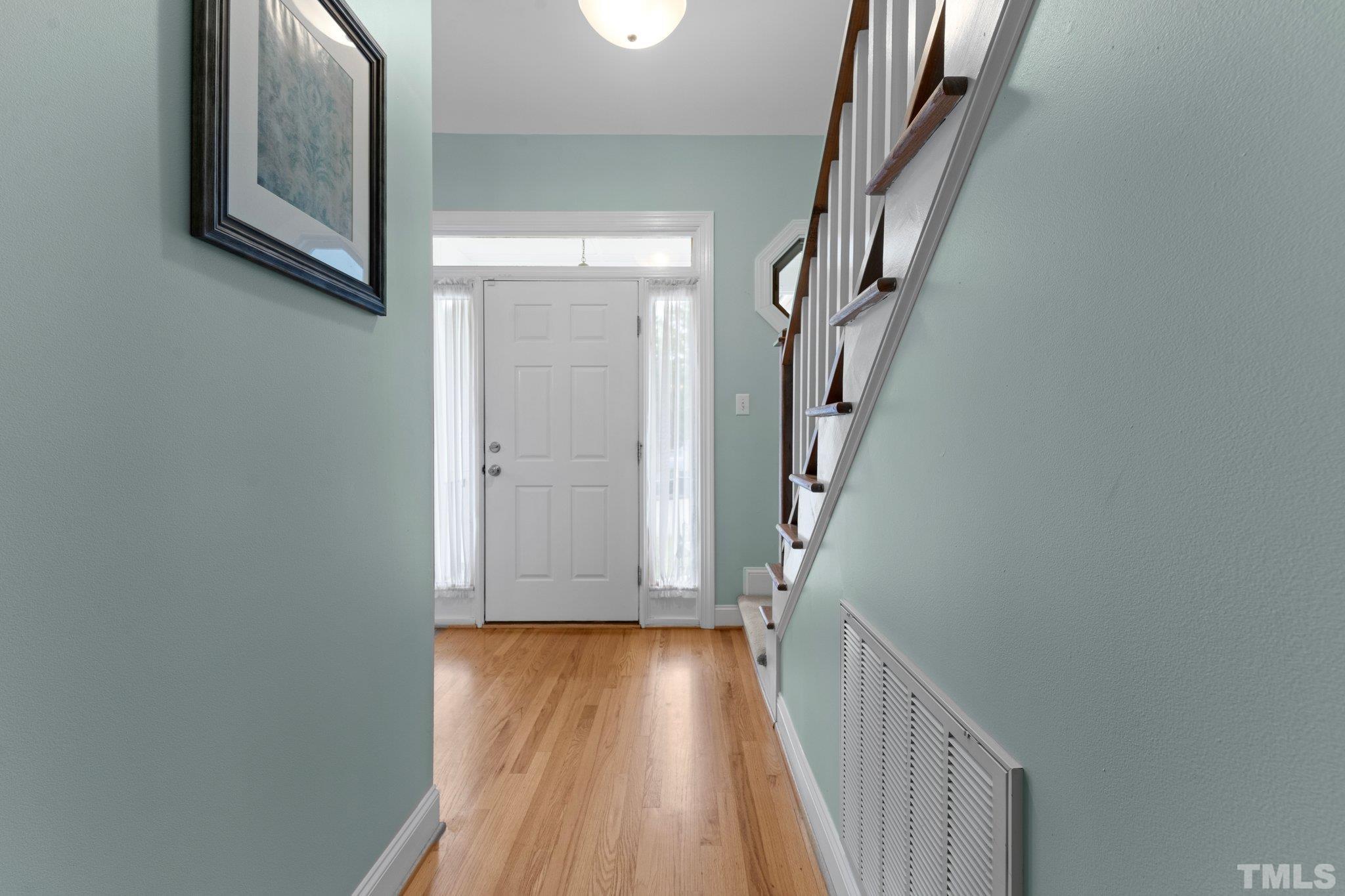 3812 Evander Way Raleigh, NC 27613 - Photo 9 of 52 a view of hallway with stairs
