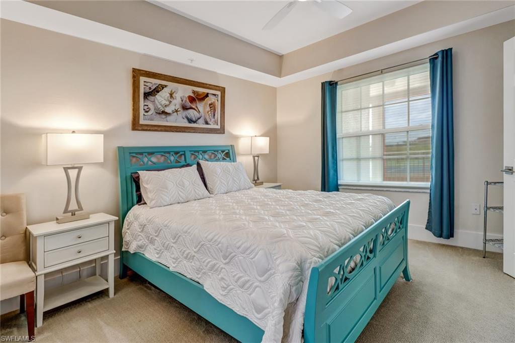 401 Bayfront Place, Unit 3306 Naples, FL 34102 - Photo 9 of 26 a bedroom with a bed and a window