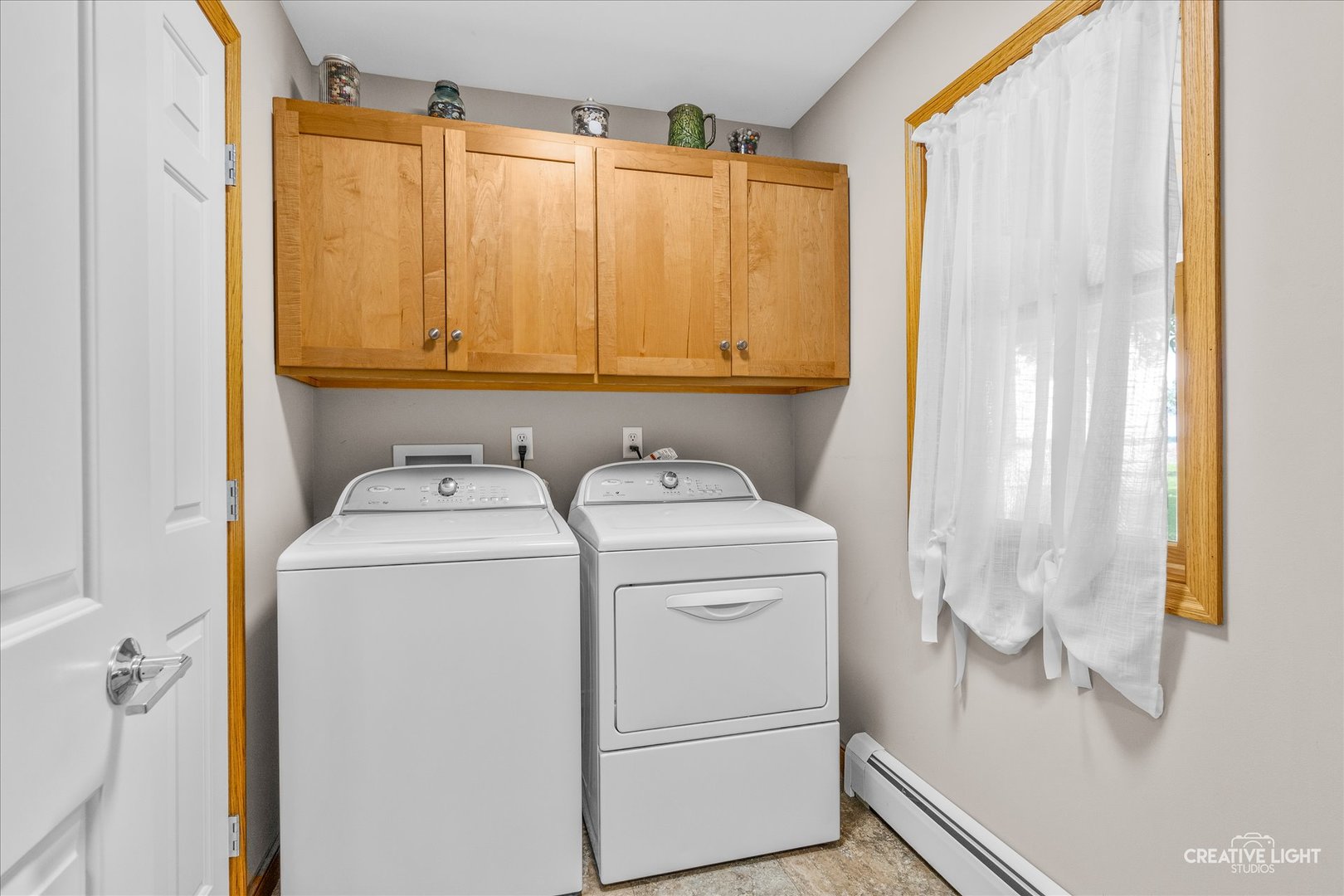 14050 Townhouse Road Newark, IL 60541 - Photo 13 of 45 a utility room with dryer and washer