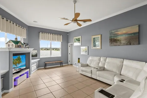 a living room with furniture and a window