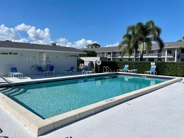 a view of outdoor space yard and swimming pool