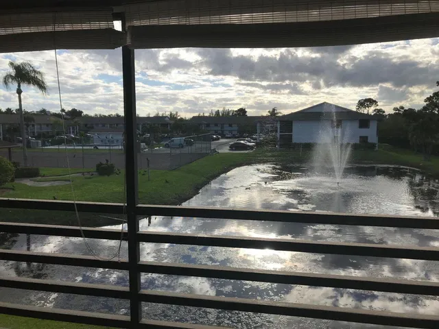 a view of a lake from a window