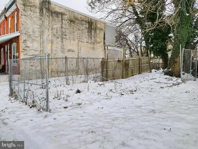 a view of snow on the road