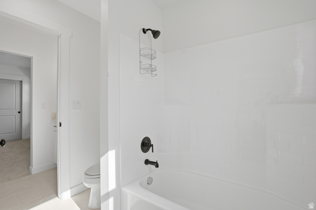 11531 Engelmann Drive Draper, UT 84020 - Photo 23 of 31 Bright white tub and shower combination featuring subway tile surround and matte black fixtures