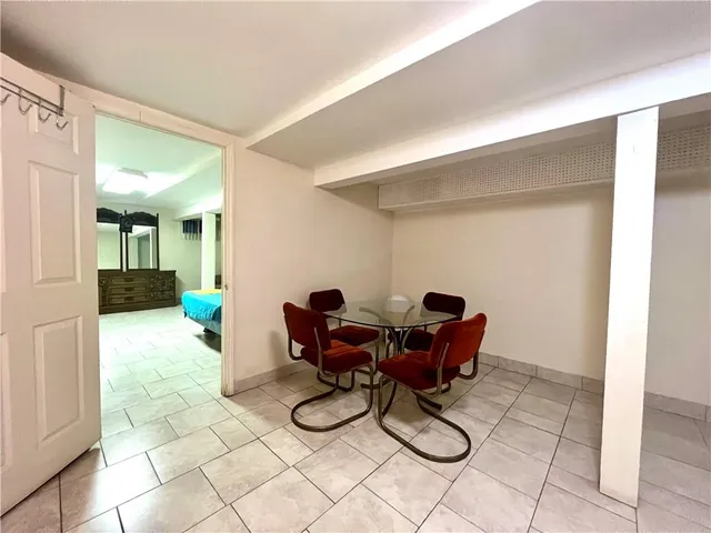 a living room with furniture and a yard