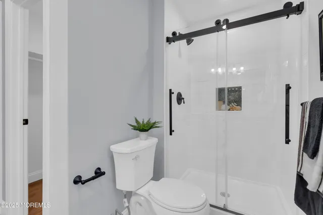 a bathroom with a sink double vanity and a mirror