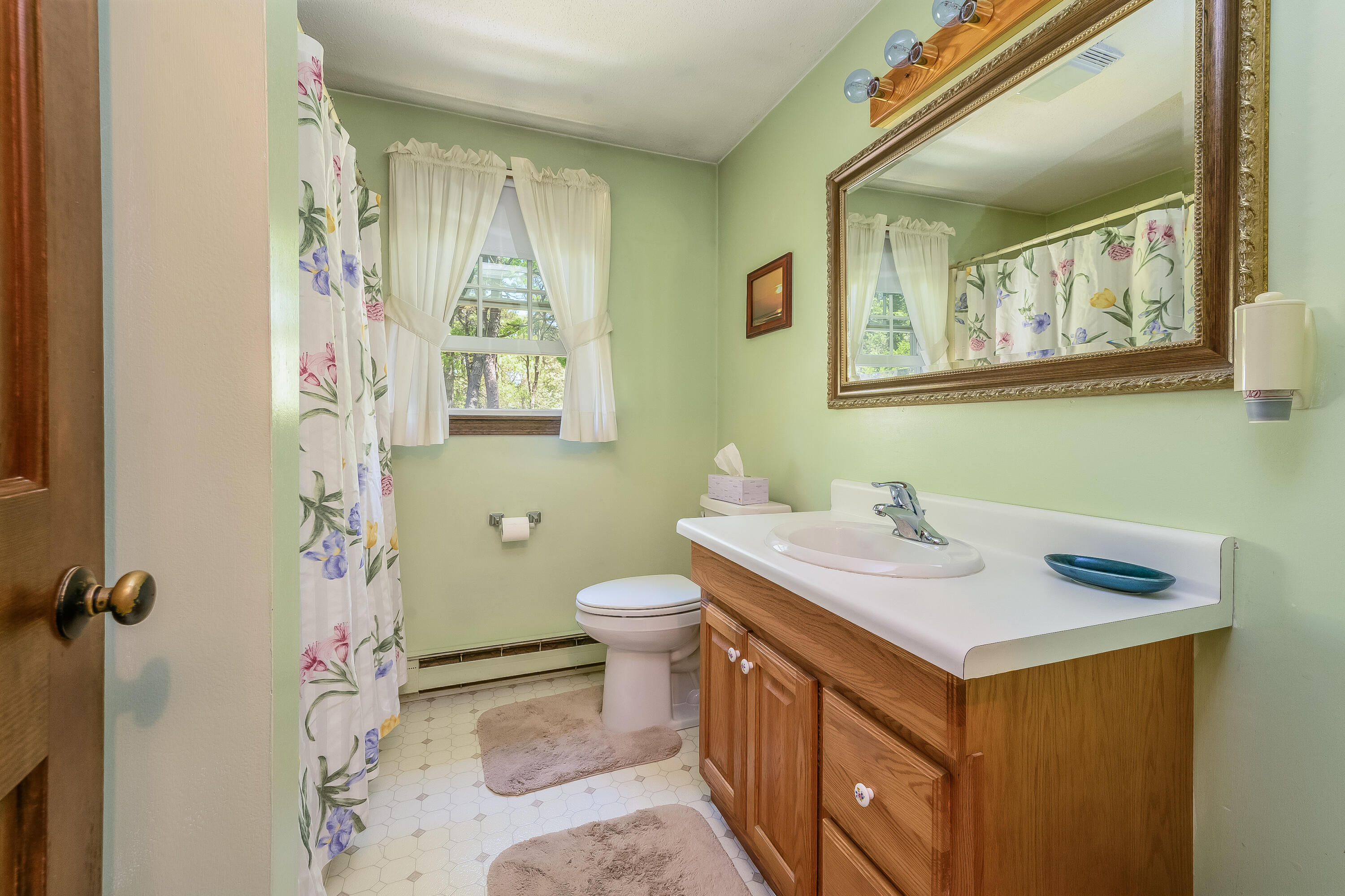106 Tower Hill Circle Brewster, MA 02631 - Photo 12 of 19 a bathroom with a sink and a mirror