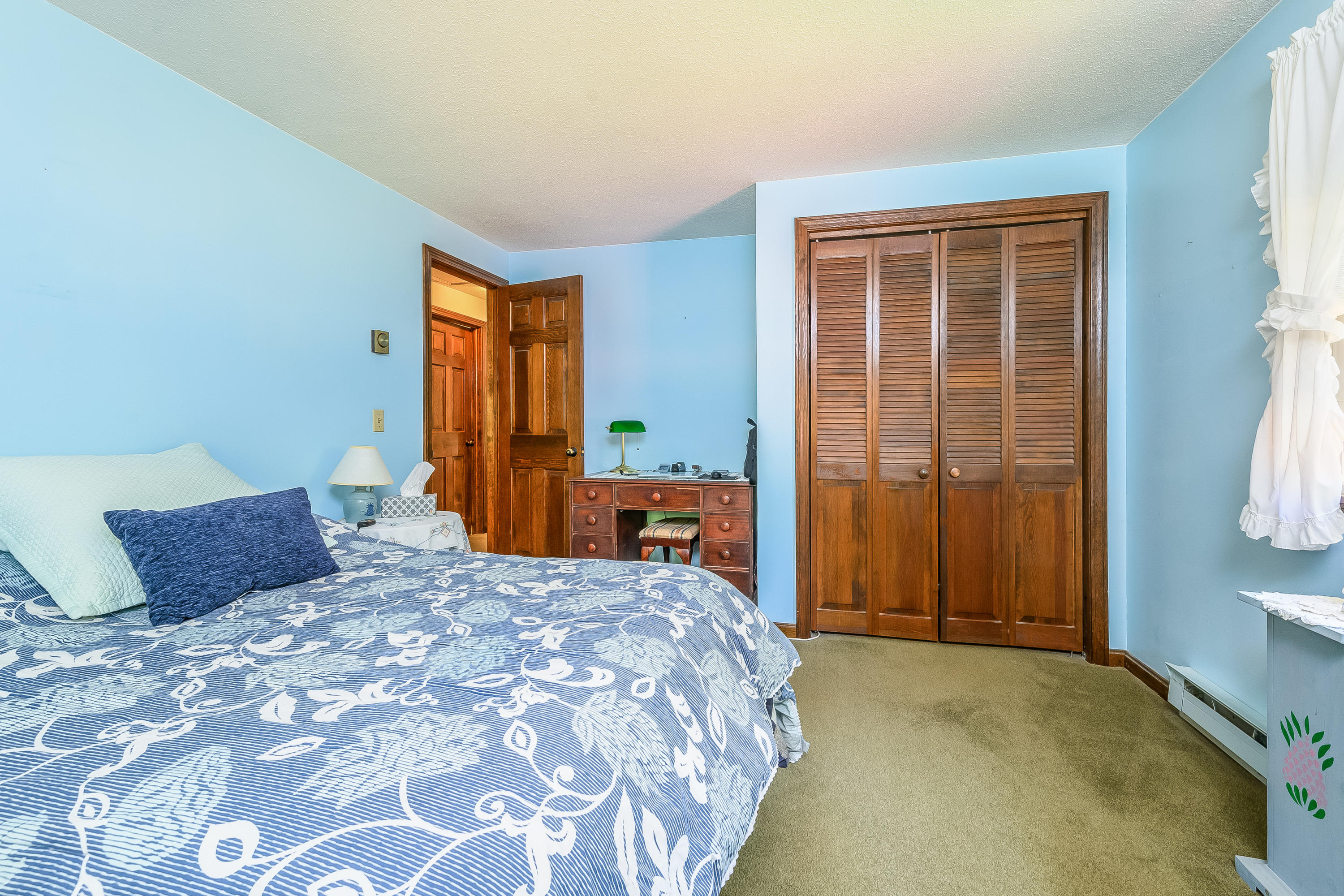 106 Tower Hill Circle Brewster, MA 02631 - Photo 14 of 19 a bedroom with a large bed and a window