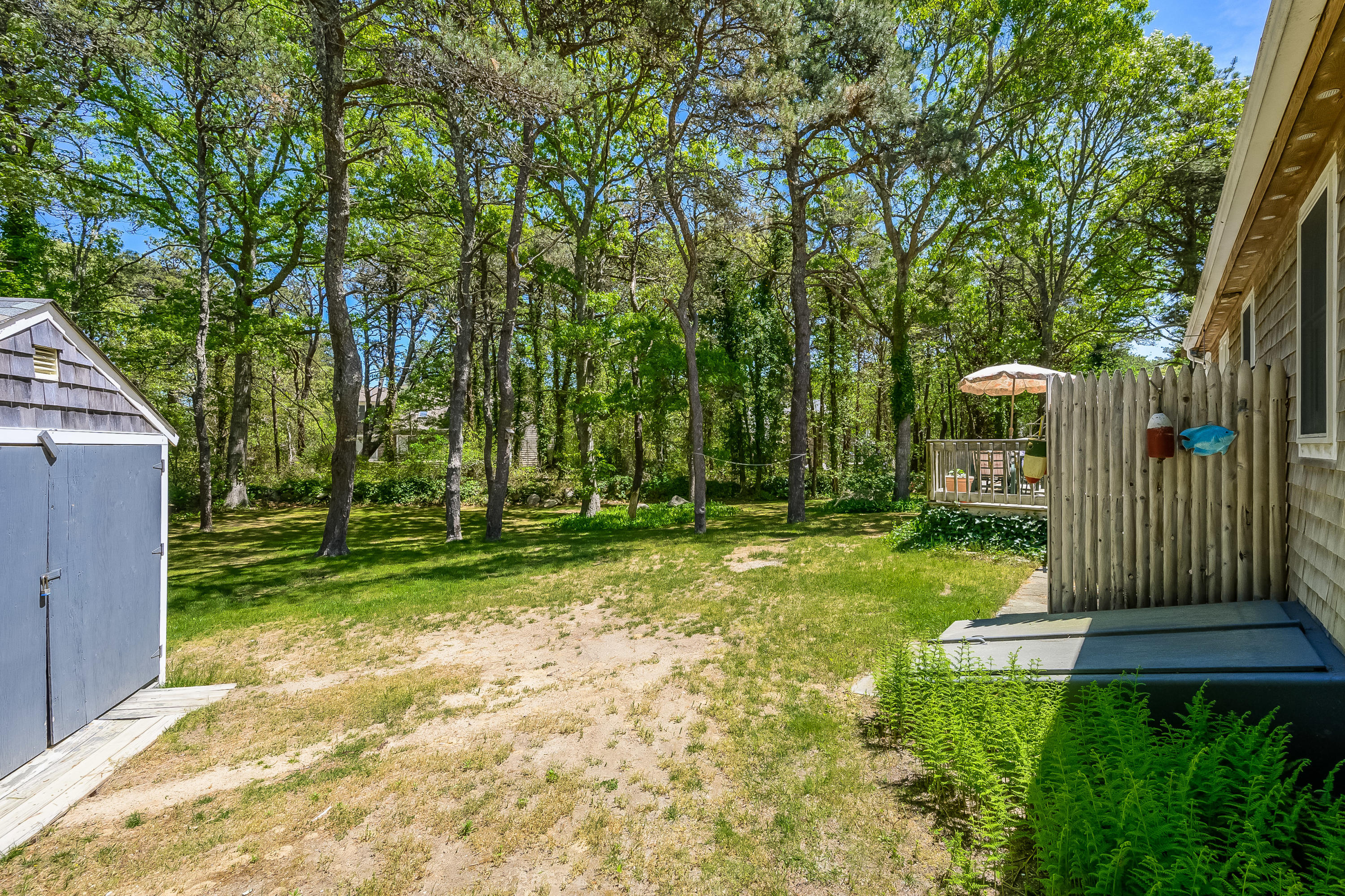 106 Tower Hill Circle Brewster, MA 02631 - Photo 17 of 19 a view of a garden