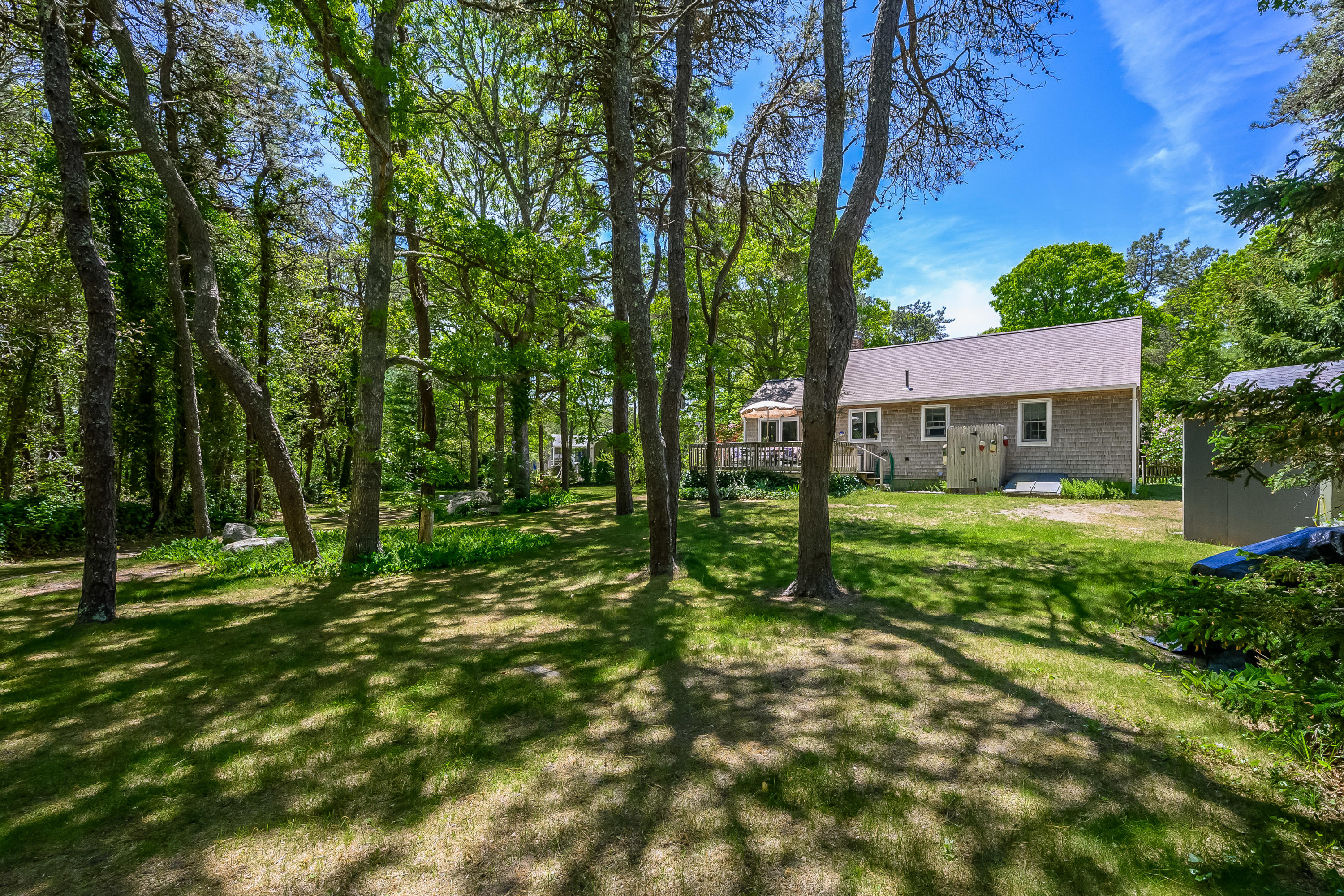 106 Tower Hill Circle Brewster, MA 02631 - Photo 19 of 19 a view of a house with a yard
