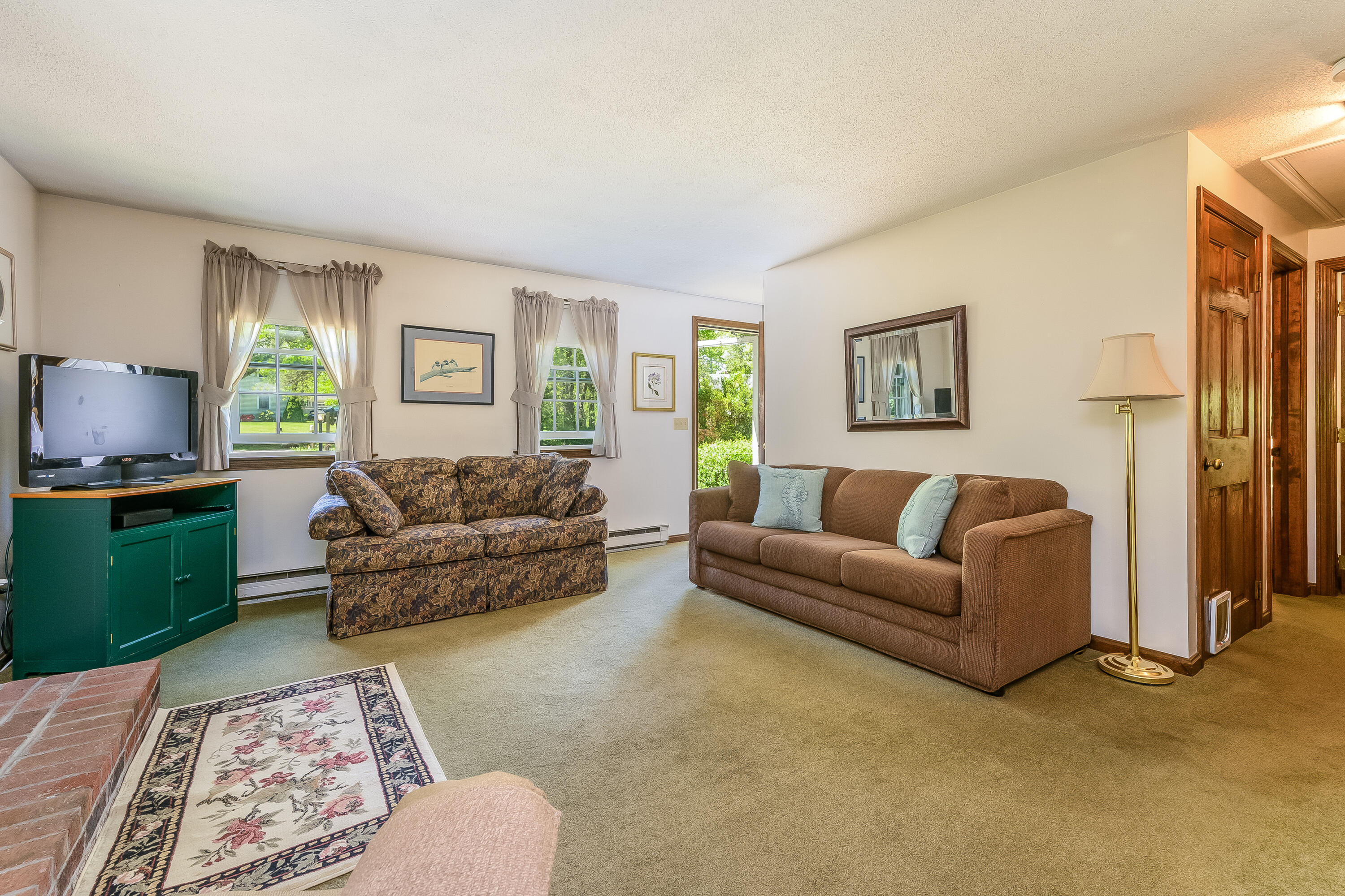 106 Tower Hill Circle Brewster, MA 02631 - Photo 4 of 19 a living room with furniture and a window