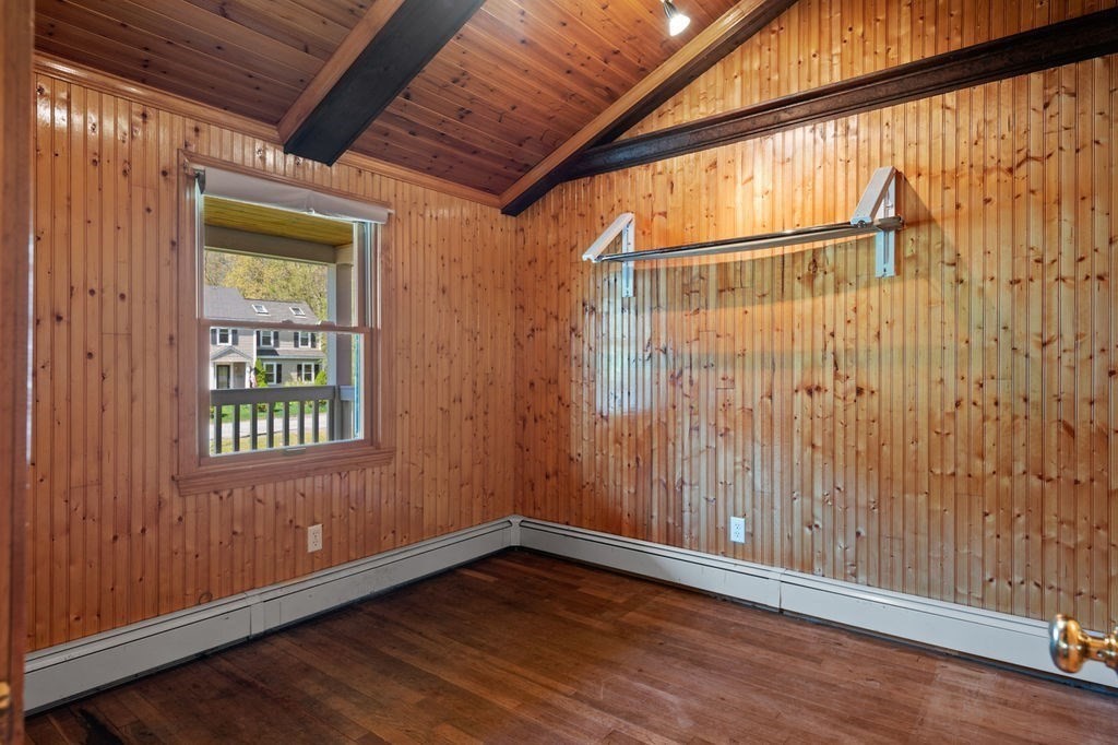 63 Middle Road Amesbury, MA 01913 - Photo 29 of 37 a view of an empty room with wooden floor and a window
