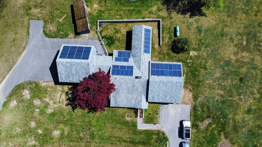63 Middle Road Amesbury, MA 01913 - Photo 36 of 37 an aerial view of a house with garden space and street view
