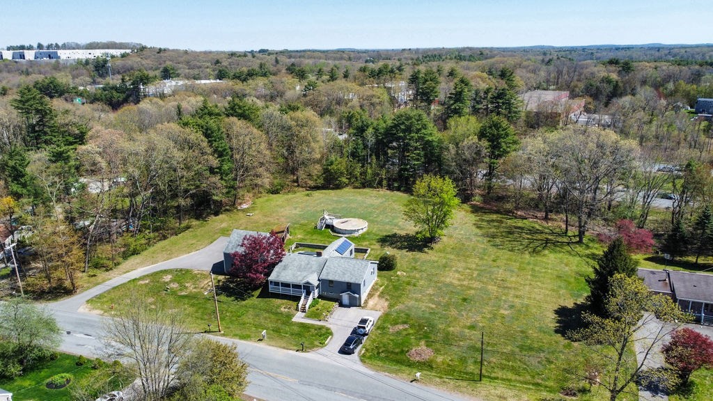 63 Middle Road Amesbury, MA 01913 - Photo 37 of 37 an aerial view of a house with a yard