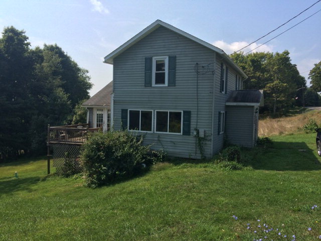 a house view with a garden space