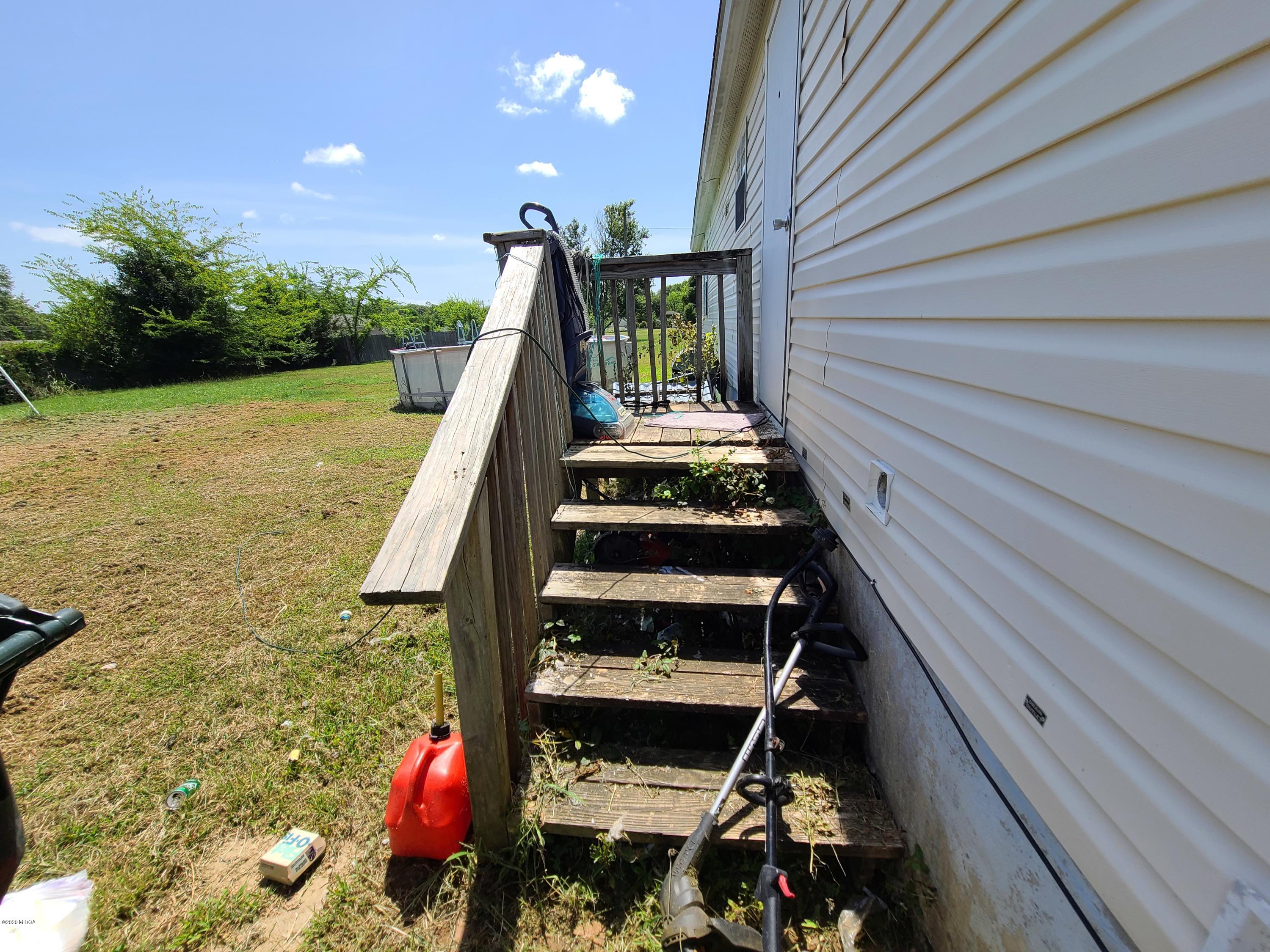 512 Boy Scout Road Byron, GA 31008 - Photo 10 of 12 a view of deck with patio