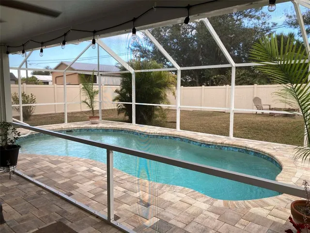 a view of outdoor space with swimming pool