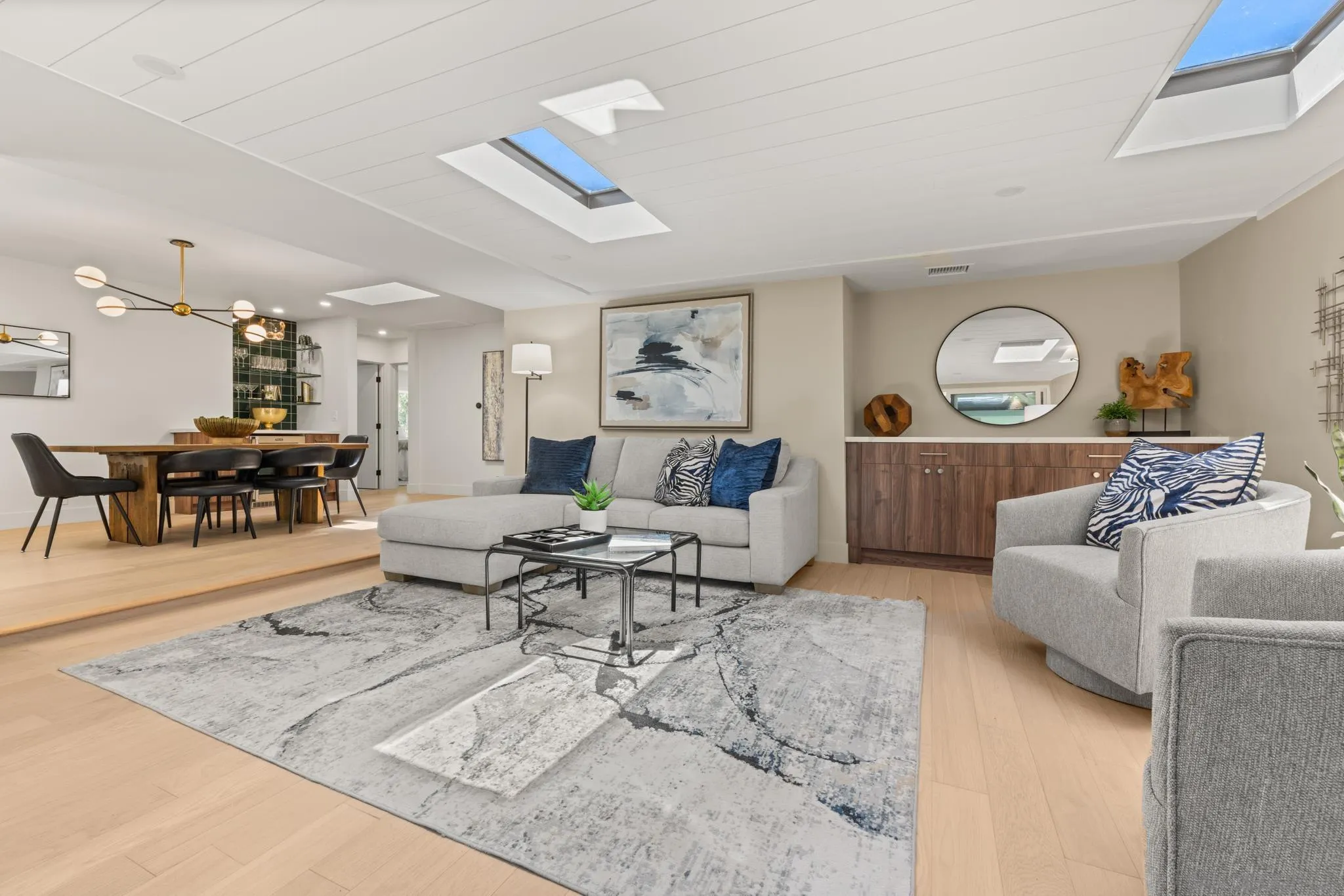 896 La Jolla Rancho Road La Jolla, CA 92037 - Photo 15 of 54 a living room with furniture and a large window