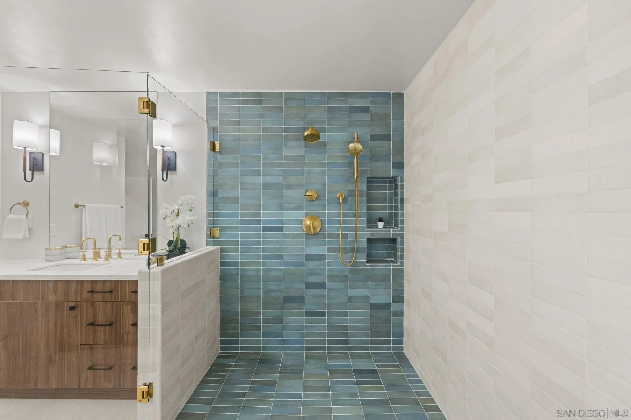 896 La Jolla Rancho Road La Jolla, CA 92037 - Photo 16 of 54 a bathroom with a shower and a sink