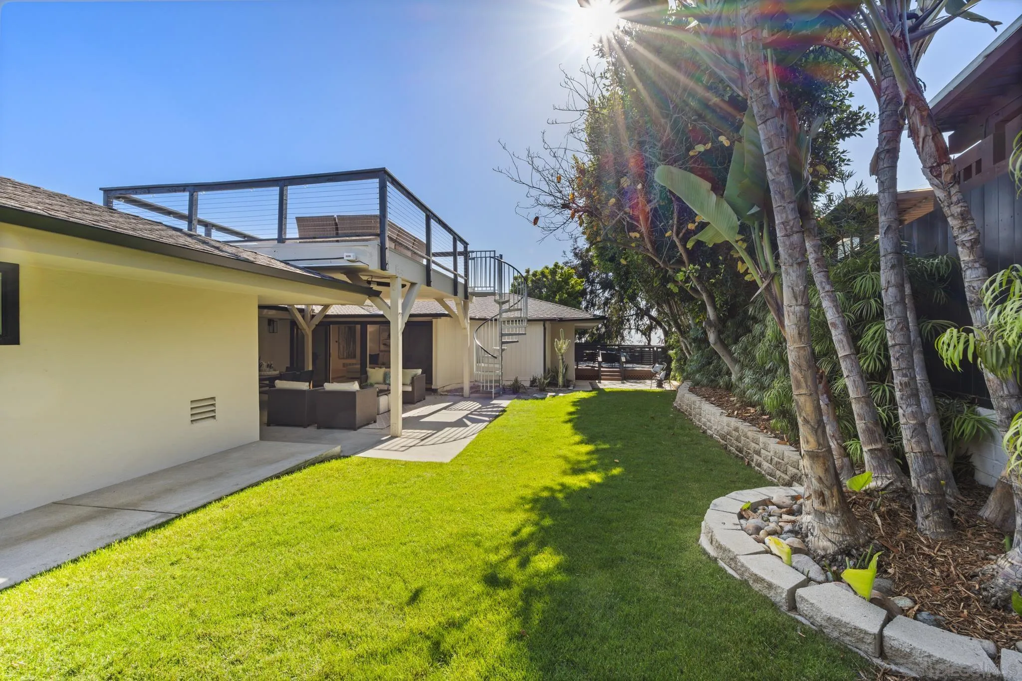 896 La Jolla Rancho Road La Jolla, CA 92037 - Photo 20 of 54 a view of a swimming pool with a patio