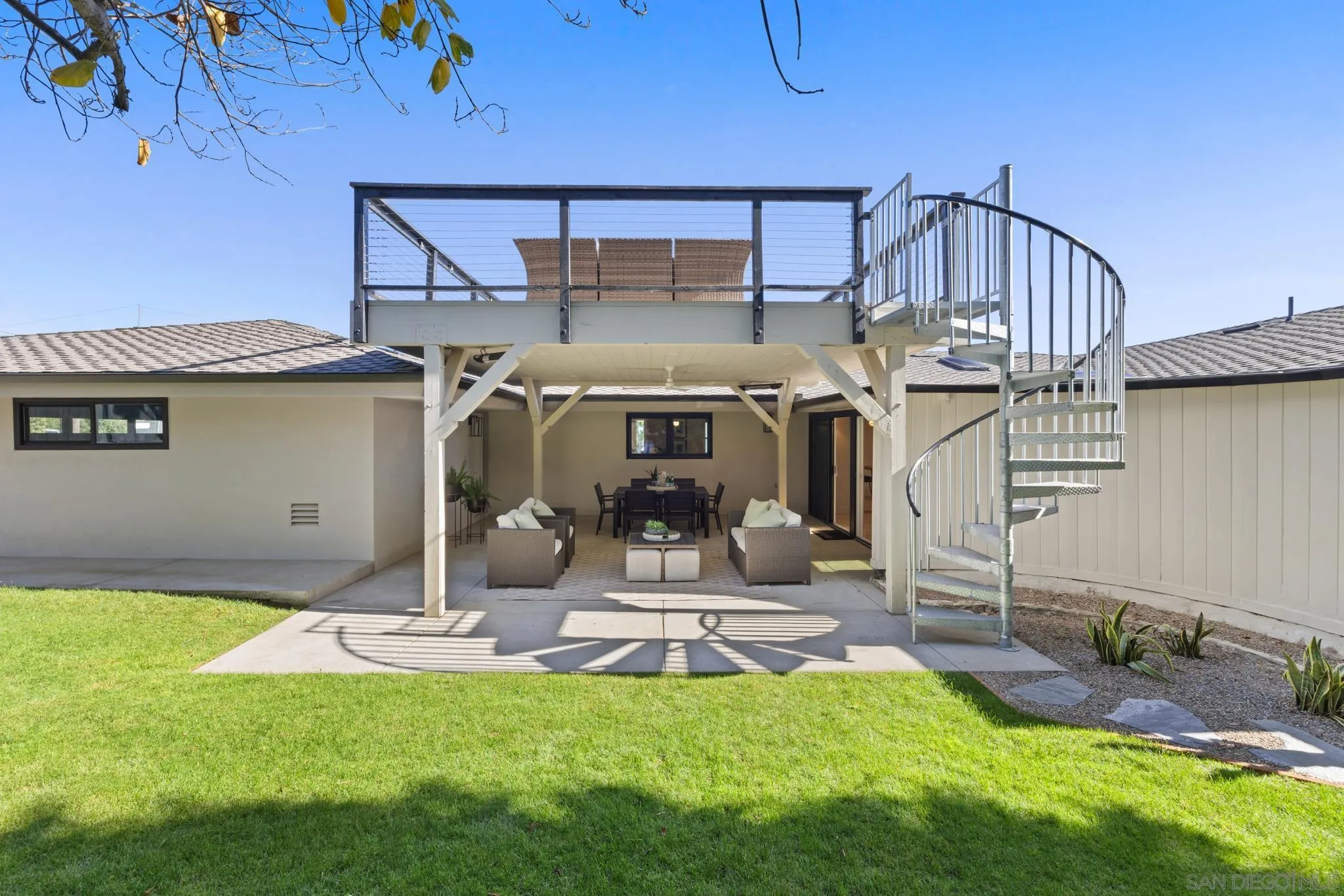 896 La Jolla Rancho Road La Jolla, CA 92037 - Photo 27 of 54 a view of a house with backyard