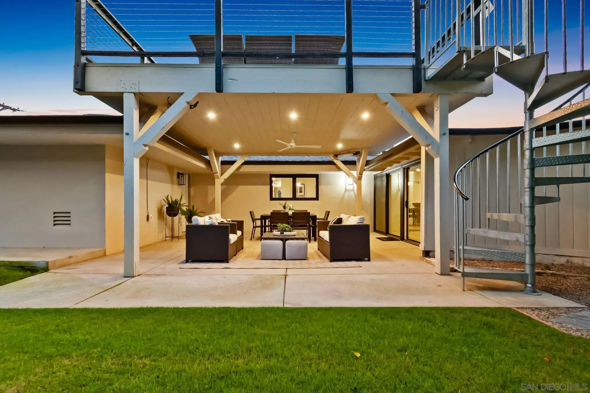 896 La Jolla Rancho Road La Jolla, CA 92037 - Photo 34 of 54 a view of a patio with table and chairs
