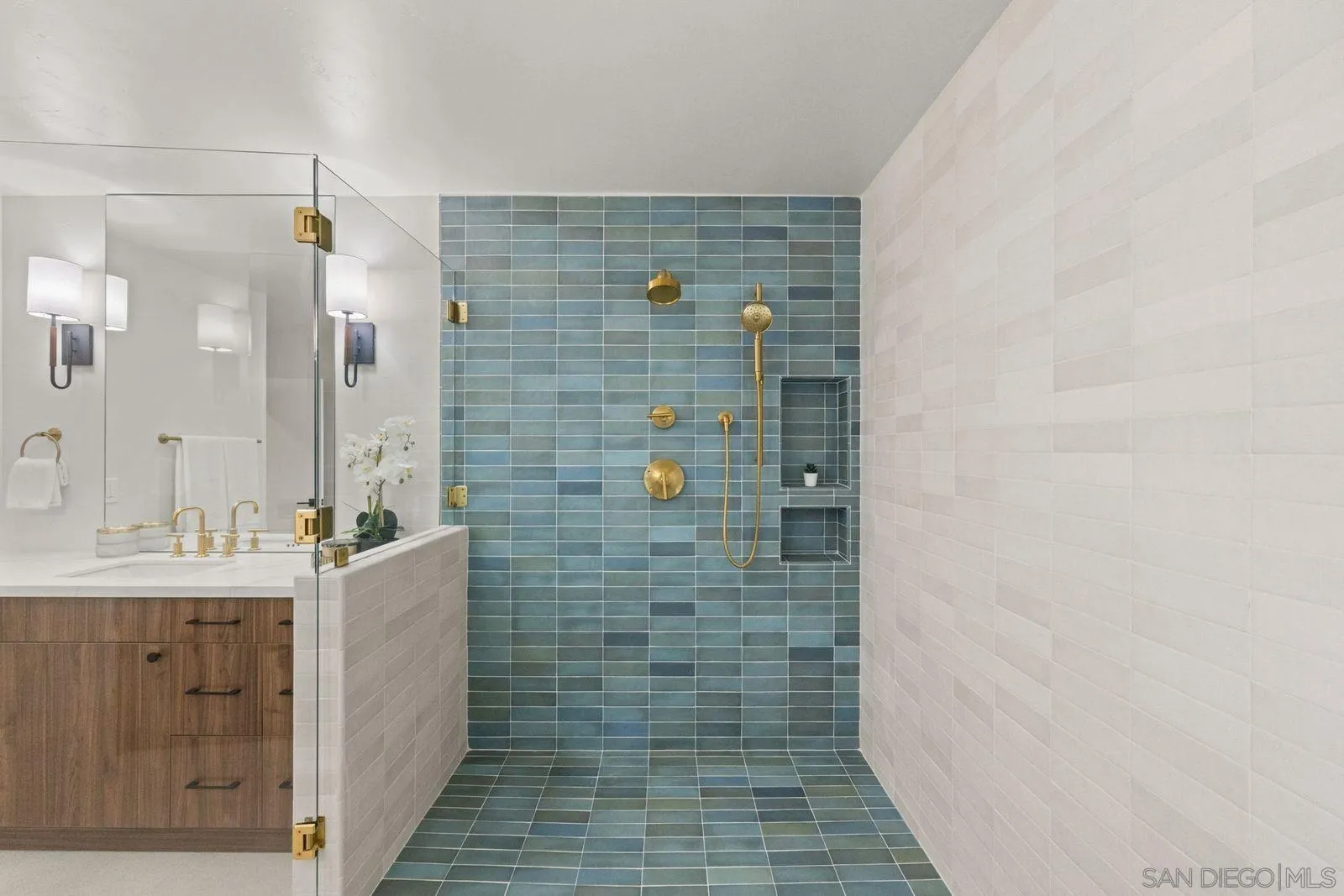 896 La Jolla Rancho Road La Jolla, CA 92037 - Photo 40 of 54 a bathroom with a shower and a sink